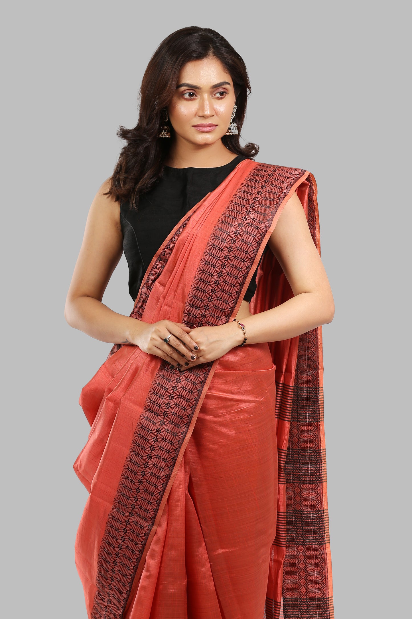 Discreet Peach Raw Silk Saree