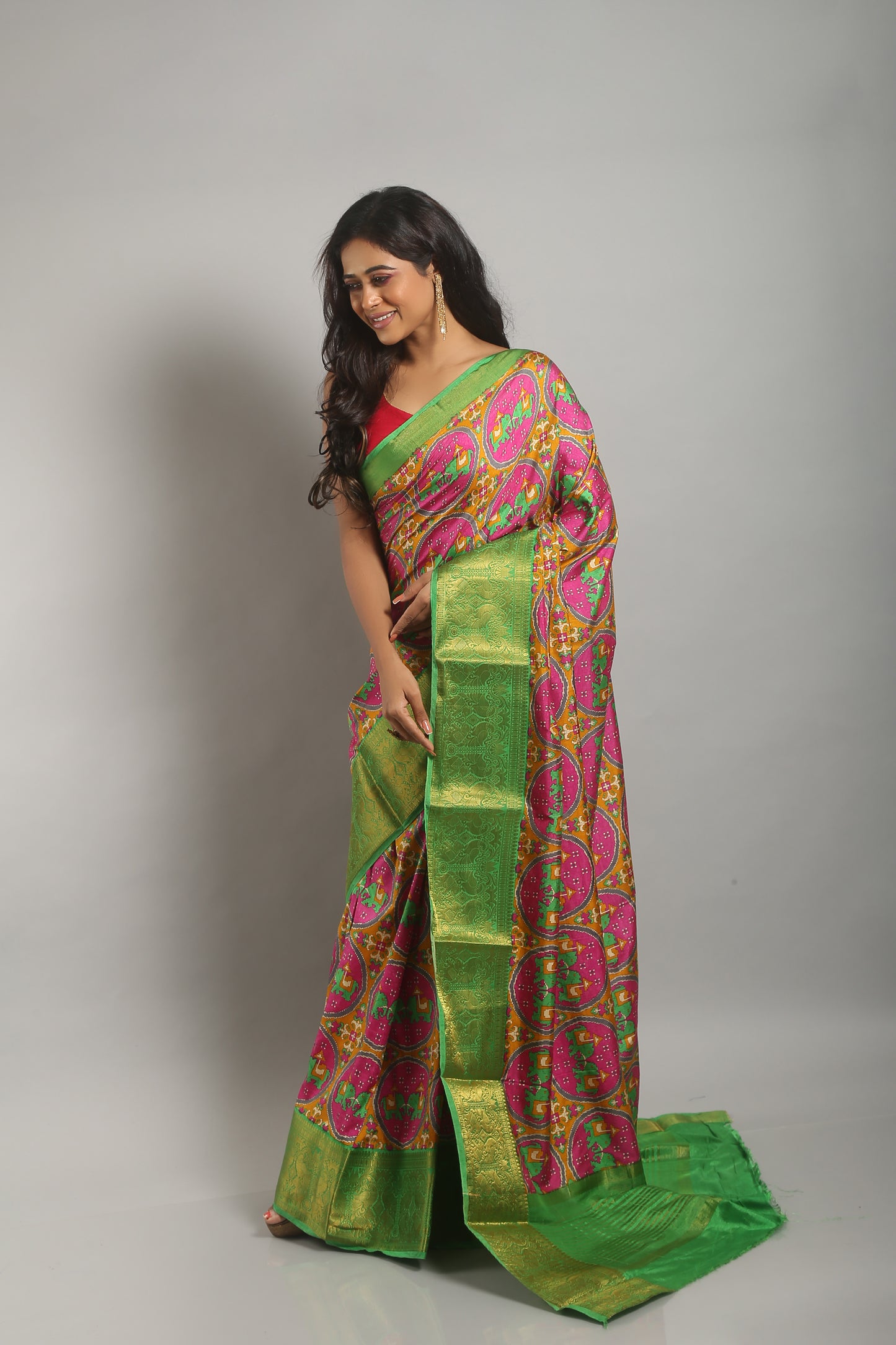 Extensive Coral Ikkat Saree