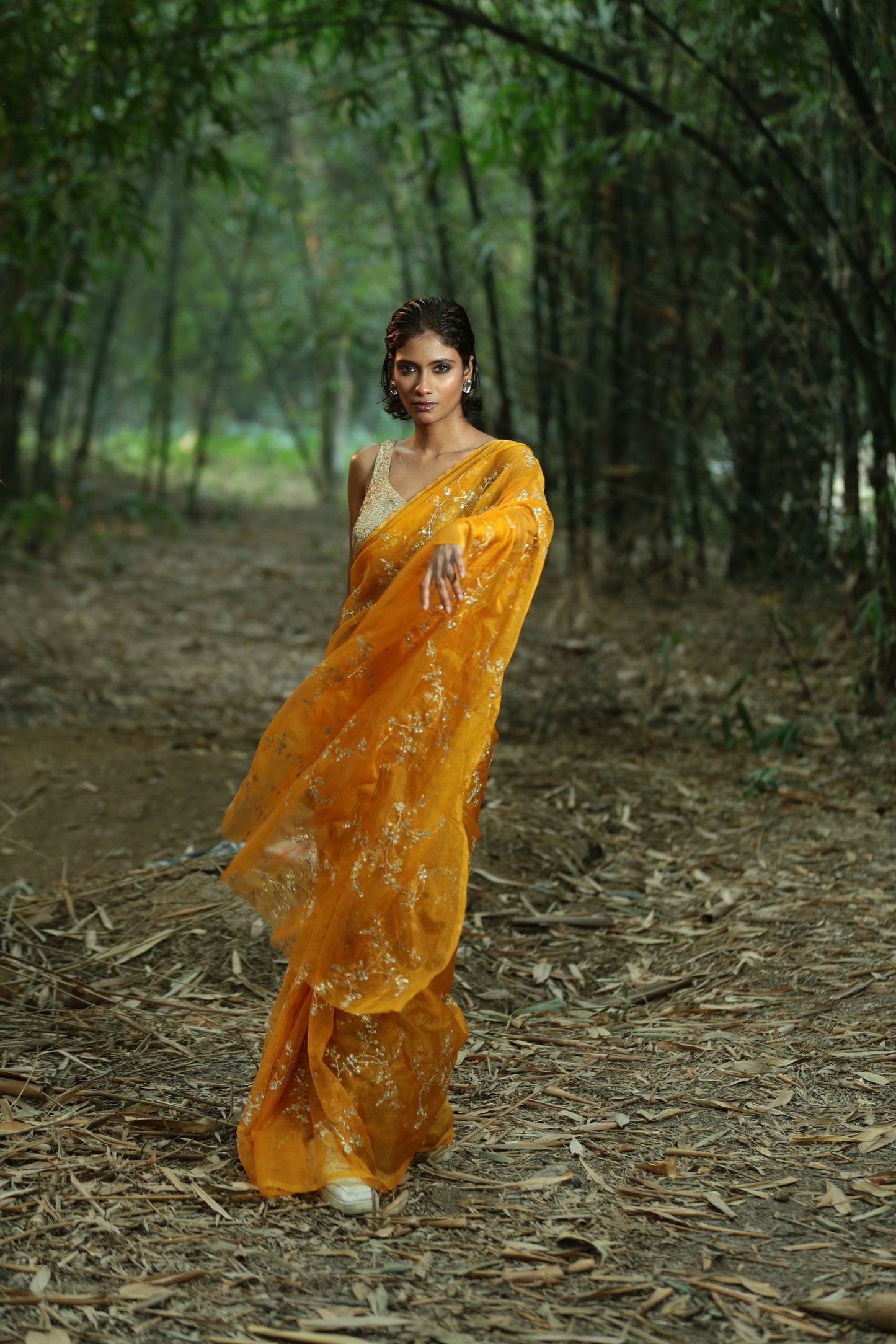 Mustard Organza saree with intricate golden threaded patterns, perfect for special occasions. | Urbane Essence