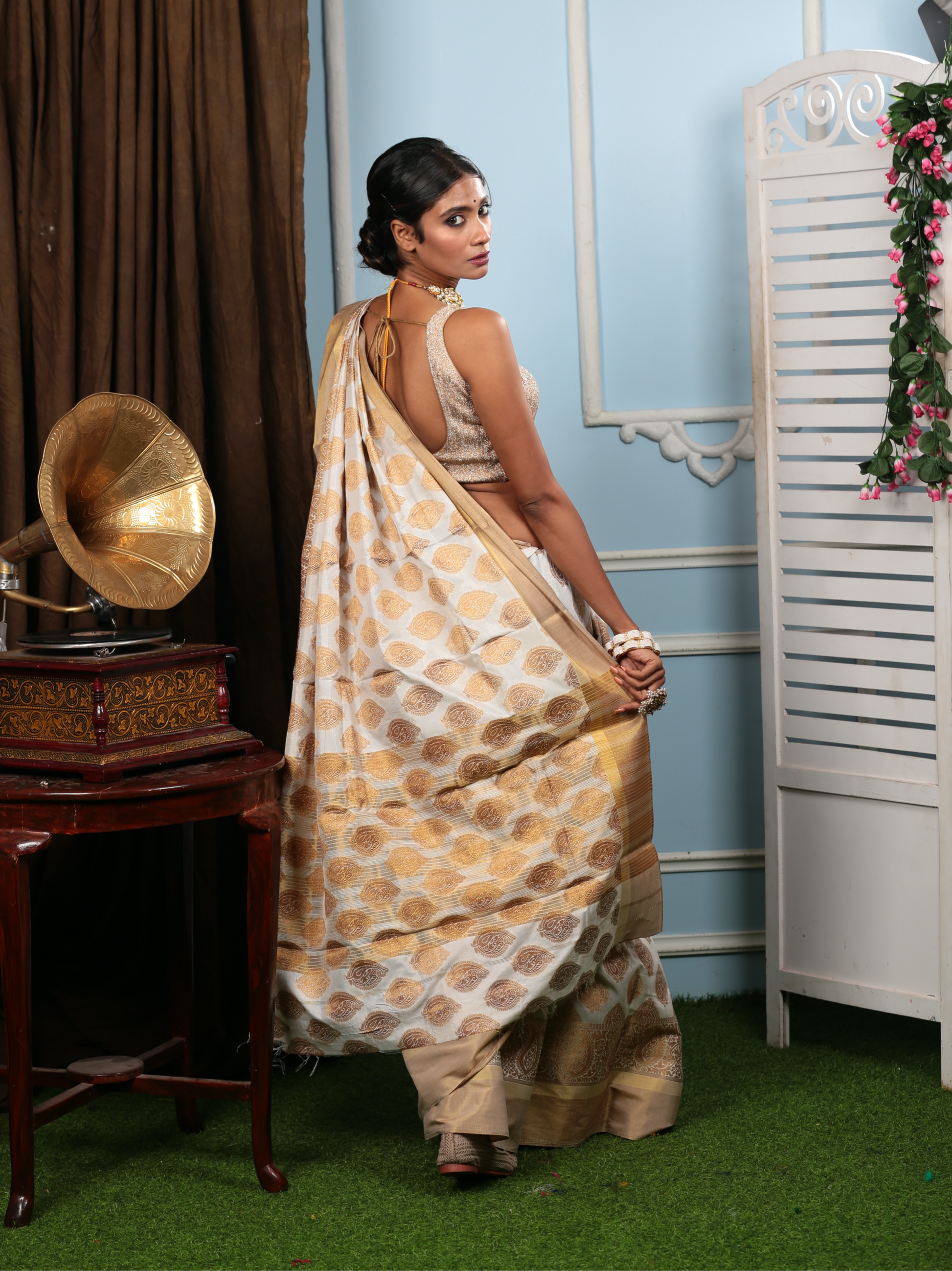 White and gold South silk saree with traditional patterns, perfect for professional events or Pujas | Urbane Essence