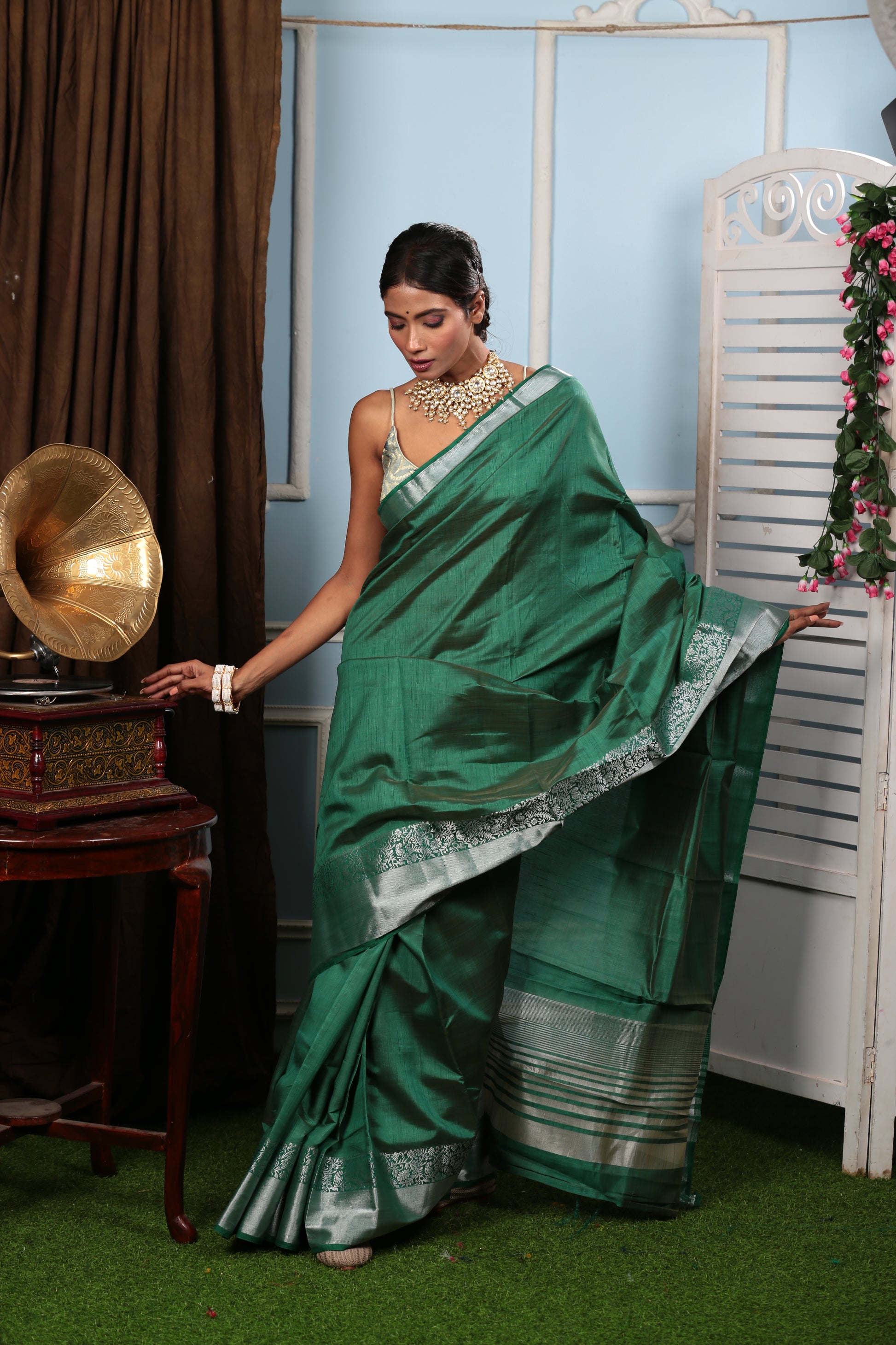 Green raw silk saree with silver border, ideal for temple wear. | Urbane Essence
