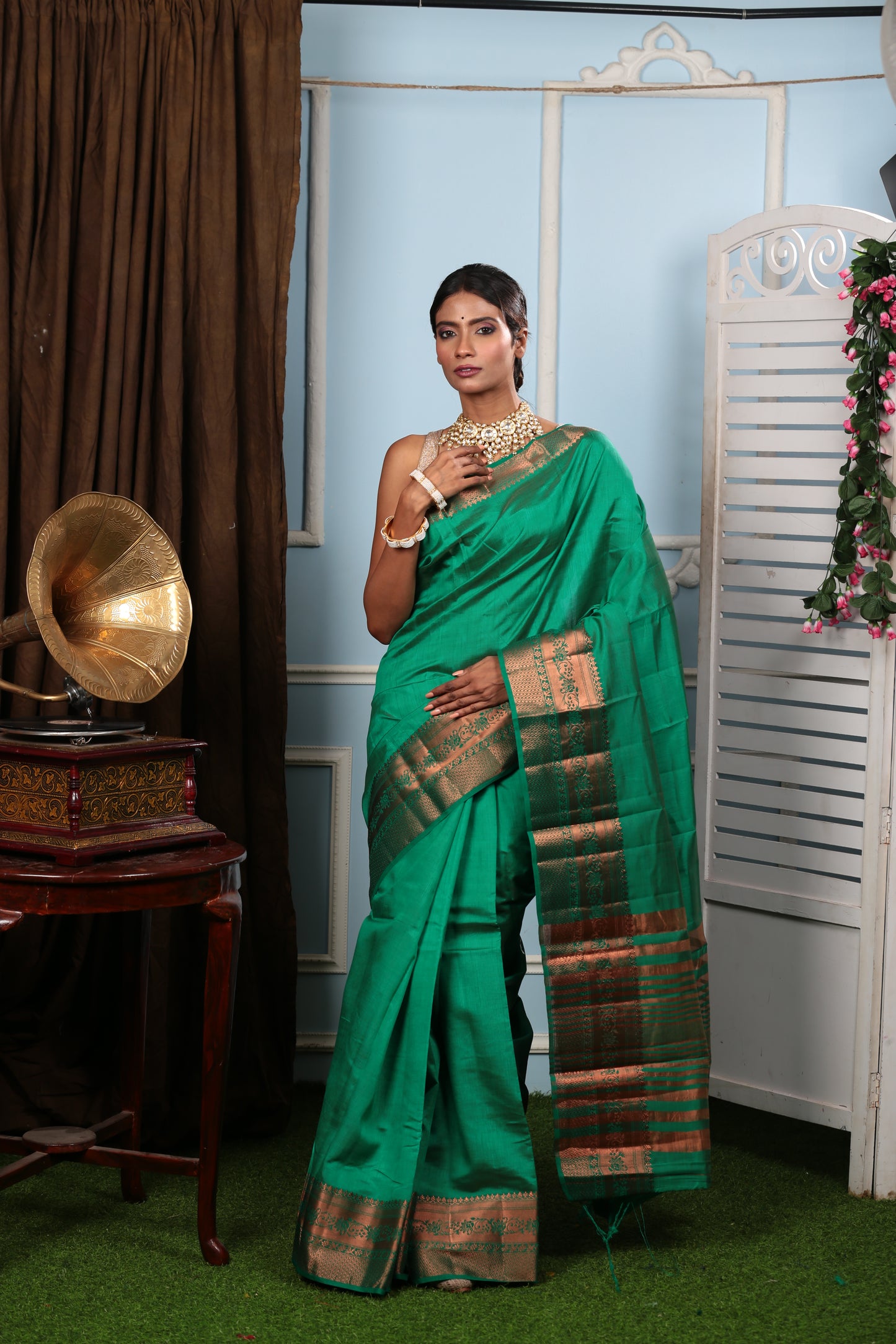 Green raw silk saree with Harappan-inspired floral pallu, ideal for temple wear. | Urbane Essence