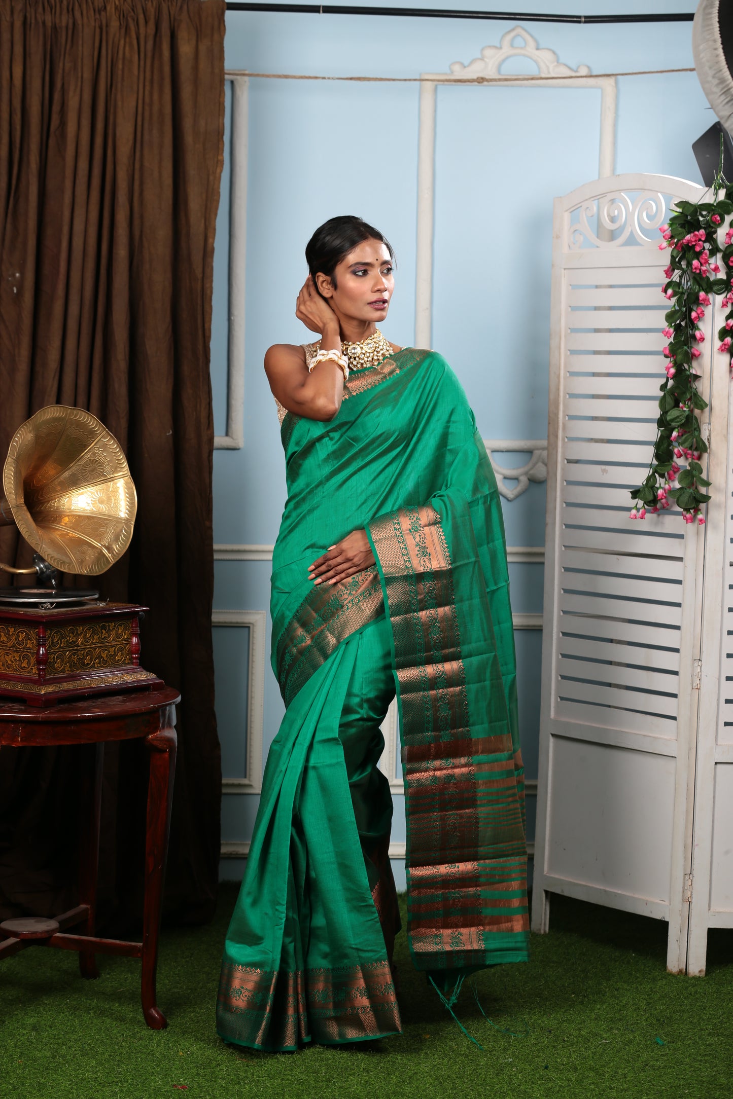 Green raw silk saree with Harappan-inspired temple fabric pallu, ideal for temple wear. | Urbane Essence