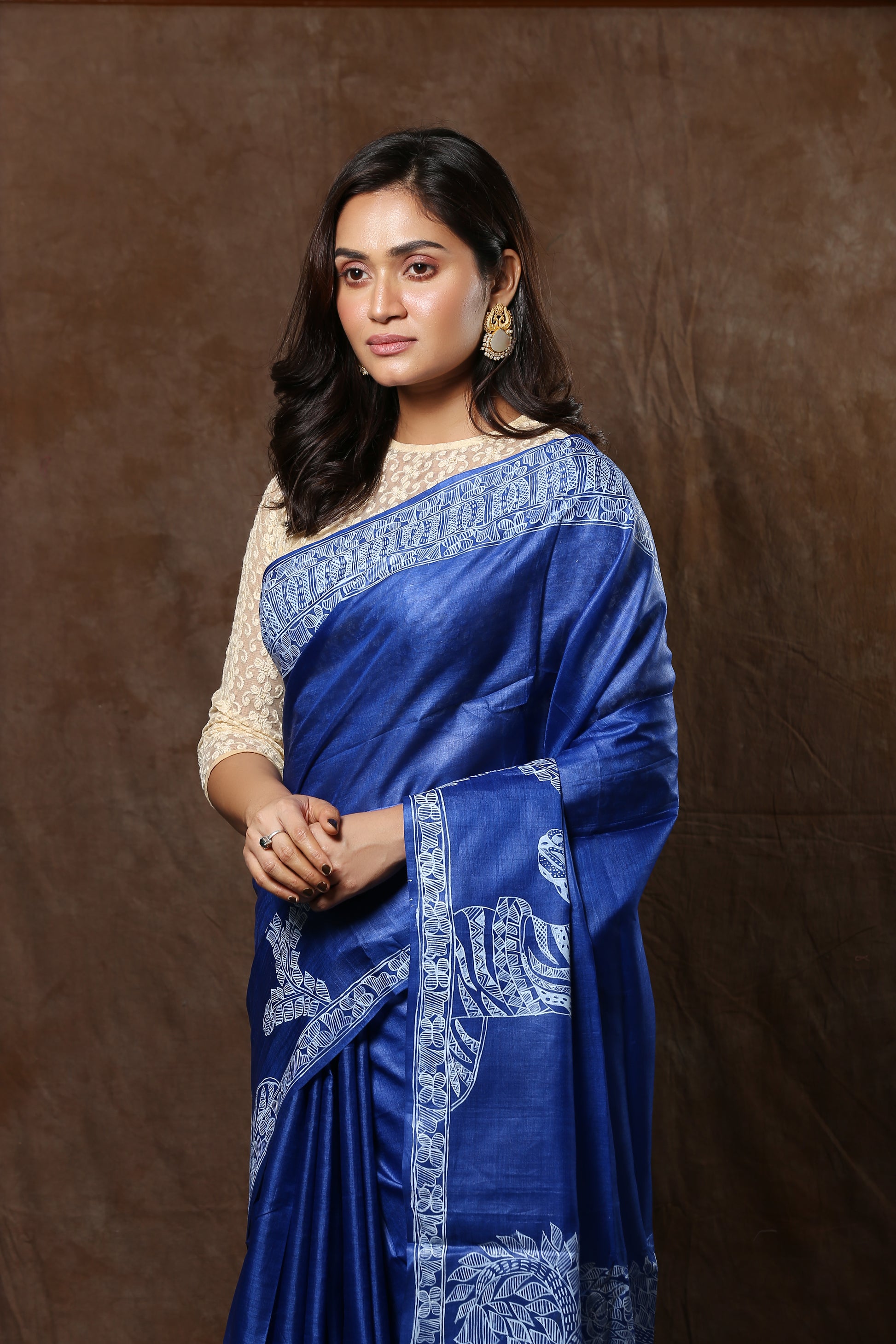 Blue Tussar silk saree with white Madhubani Zebra art, perfect for special occasions | Urbane Essence