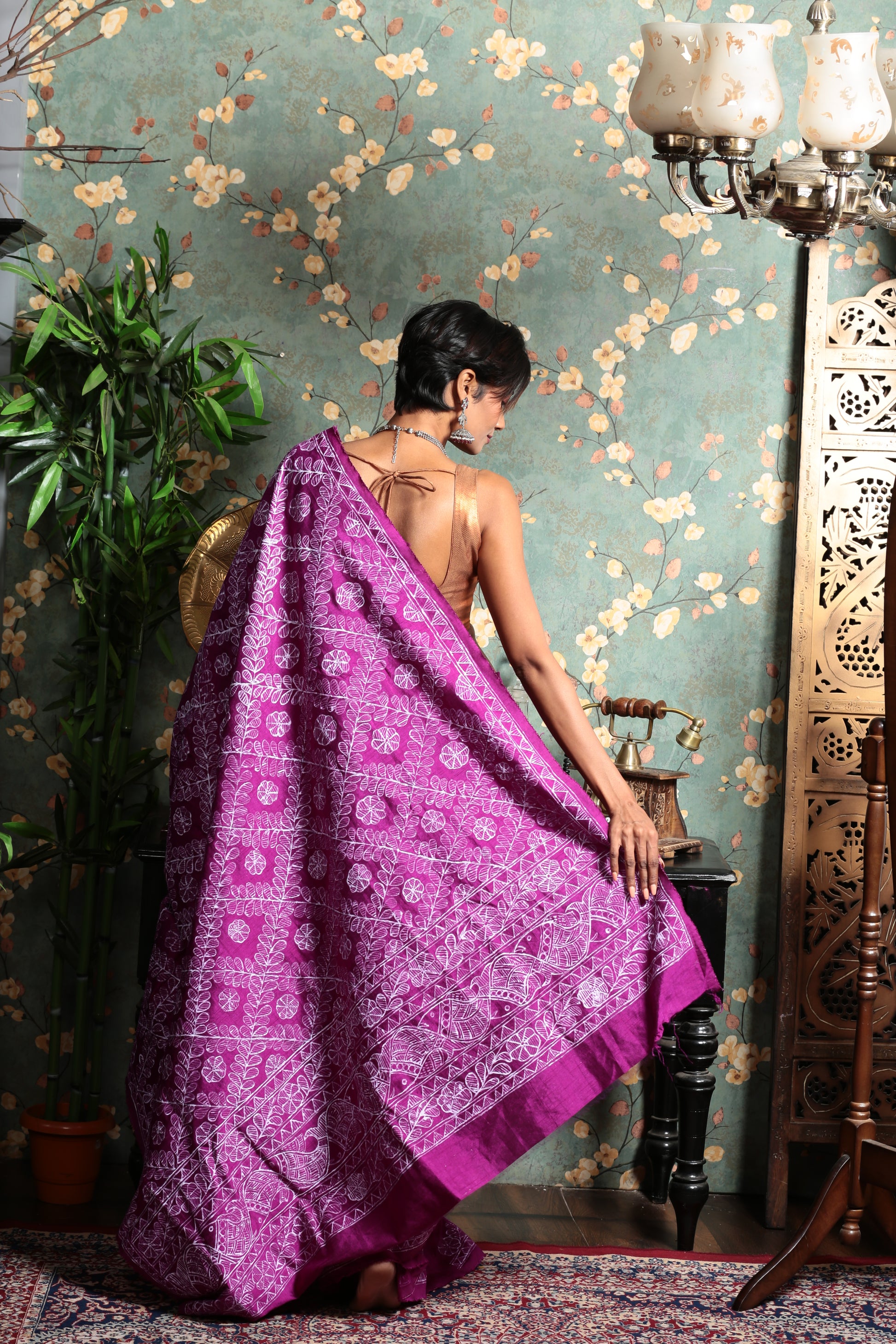 Magenta Tussar silk saree with white Madhubani painting on border and pallu, perfect for cultural events | Urbane Essence