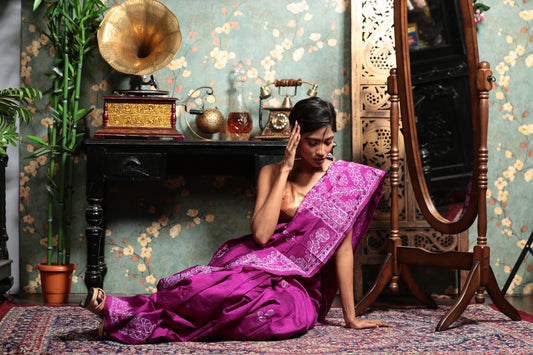 Magenta Tussar silk saree with white Madhubani painting on border and pallu, perfect for cultural events | Urbane Essence