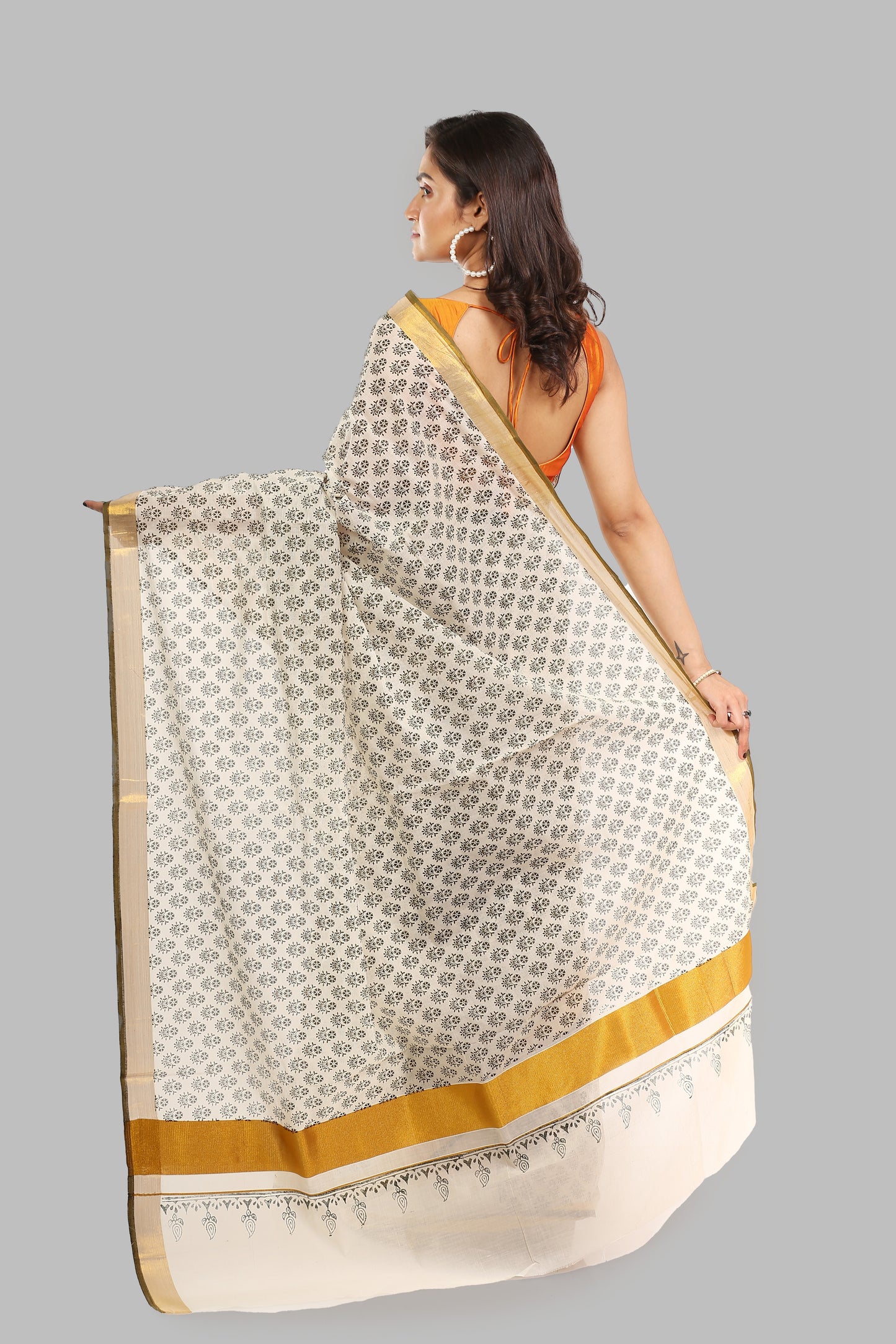 Captivating Ivory Cotton Saree