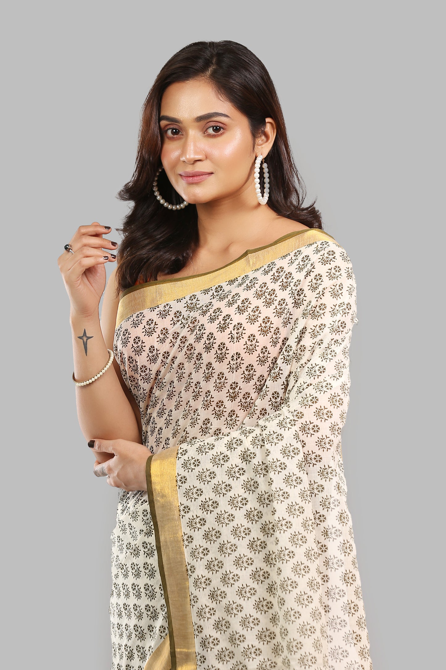Captivating Ivory Cotton Saree