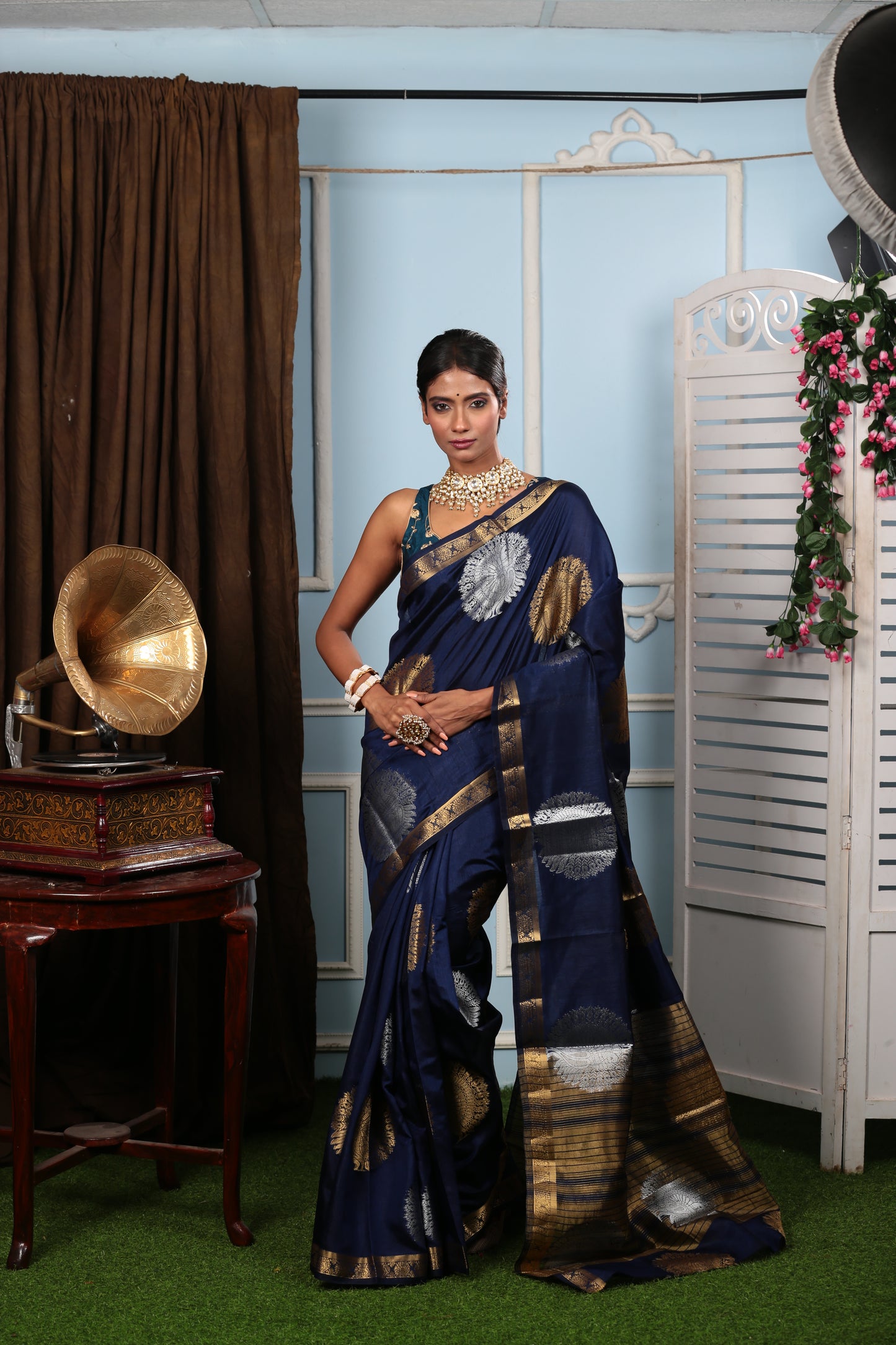 Navy blue raw silk South Indian saree with silver and gold intricate patterns, perfect for festive occasions | Urbane Essence