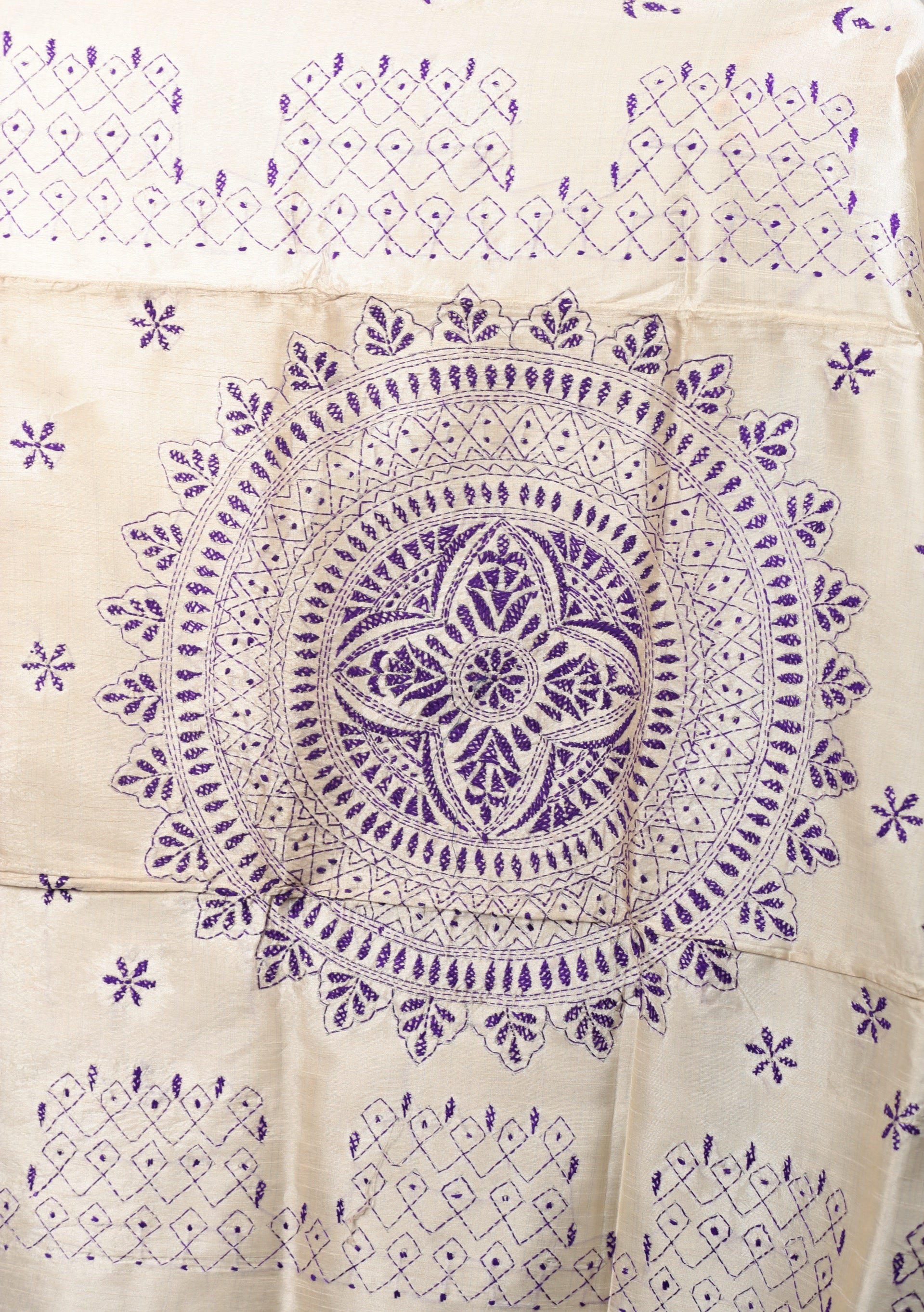 White Kantha stitch silk saree with intricate blue floral and geometric patterns, perfect for festive occasions | Urbane Essence