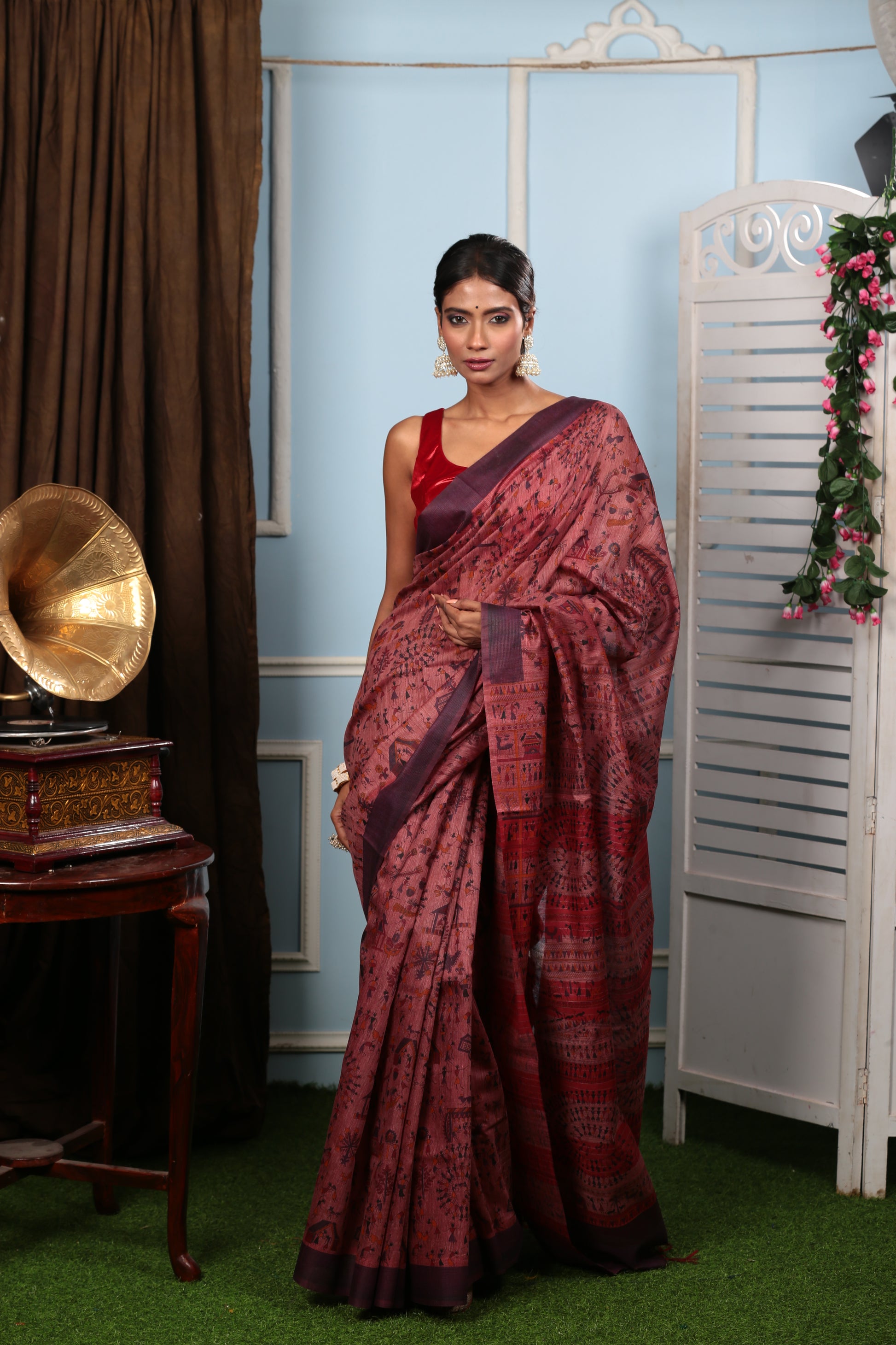 Elegant rust Warli painting silk saree with tribal art, perfect for festive occasions. | Urbane Essence