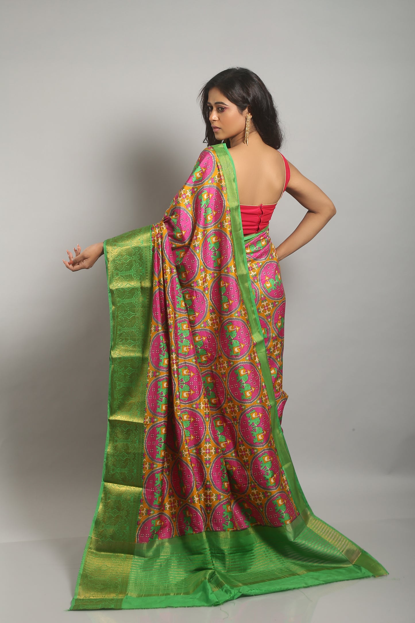 Extensive Coral Ikkat  Saree
