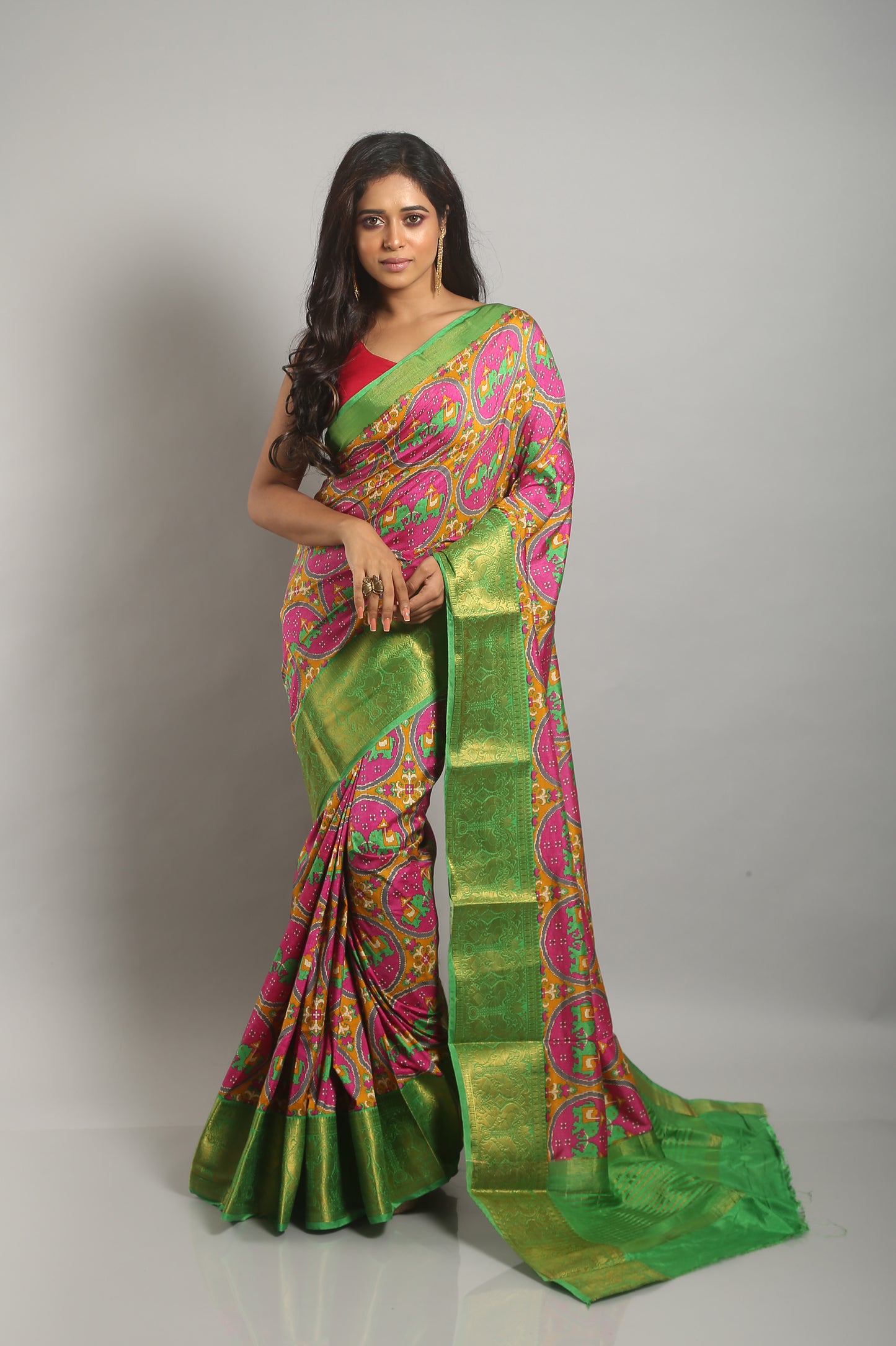 Extensive Coral Ikkat  Saree