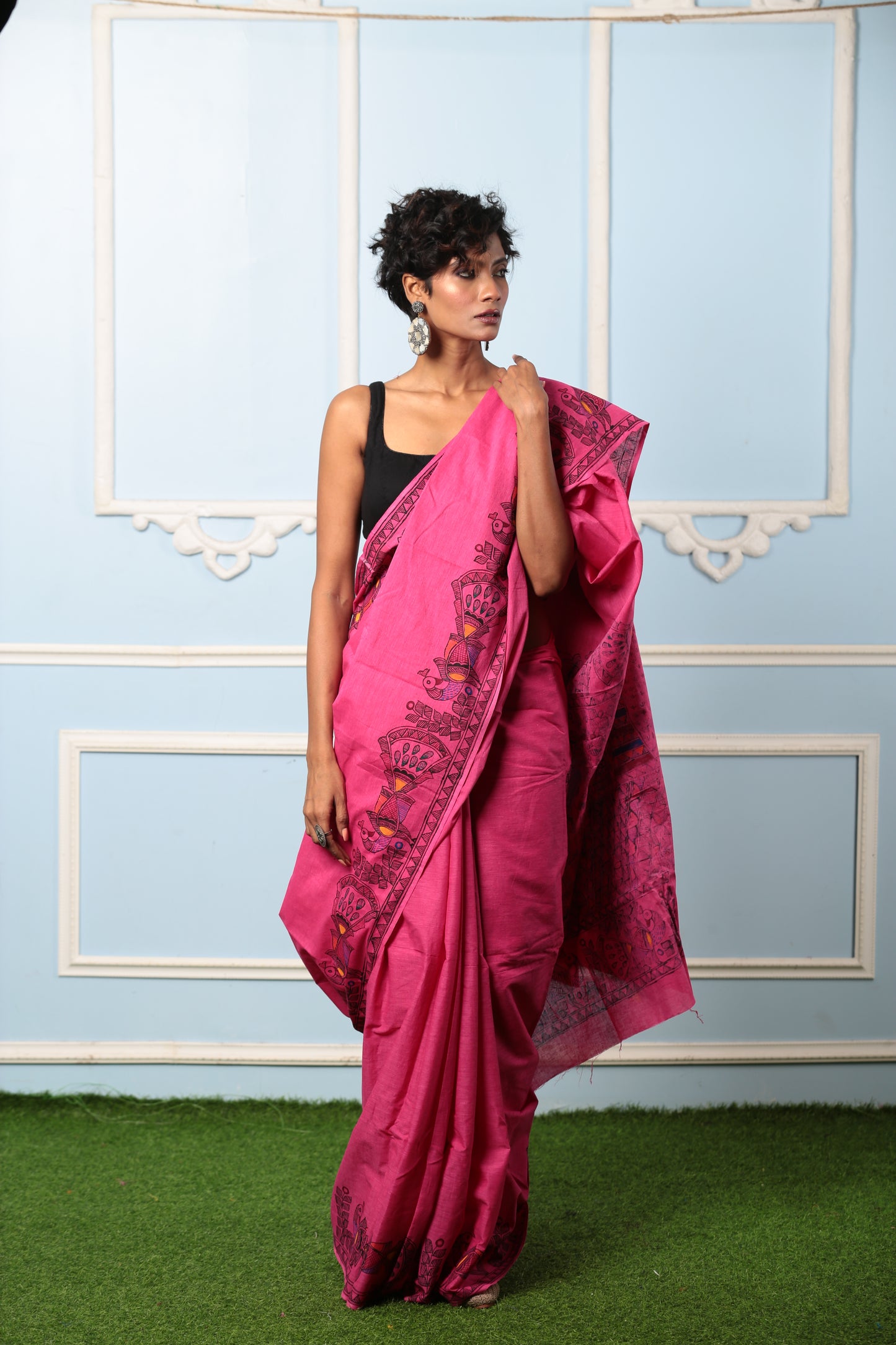 Woman in a magenta Madhubani painted Tussar silk saree, ideal for brunch or traditional occasions | Urbane Essence