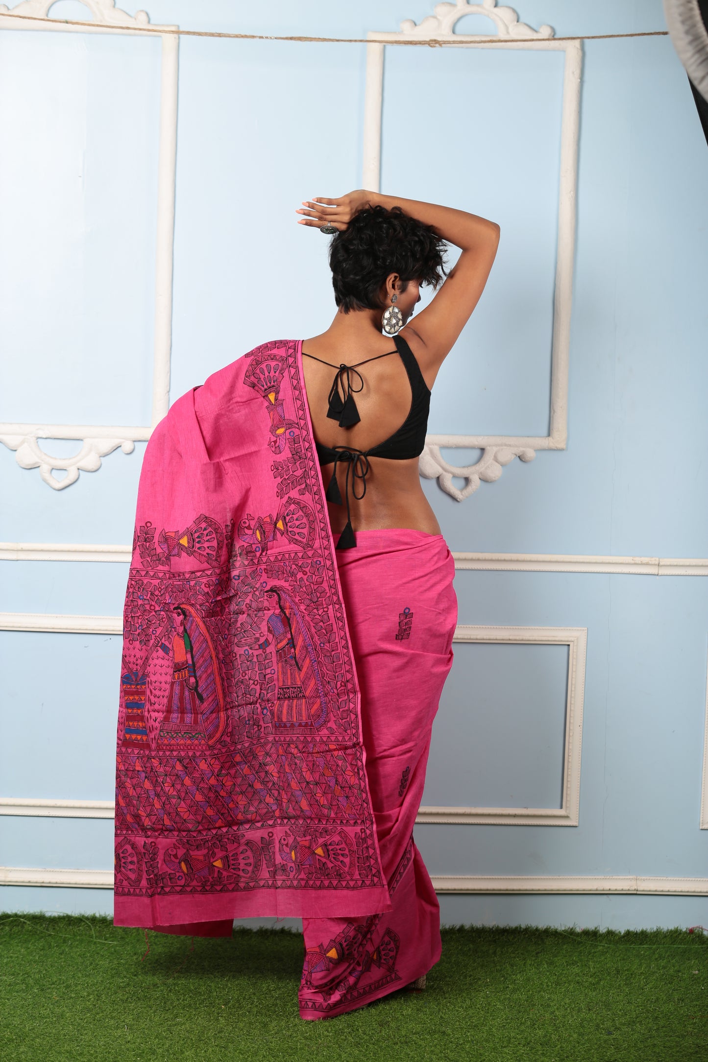 Woman in a magenta Madhubani art silk saree, ideal for brunch. | Urbane Essence