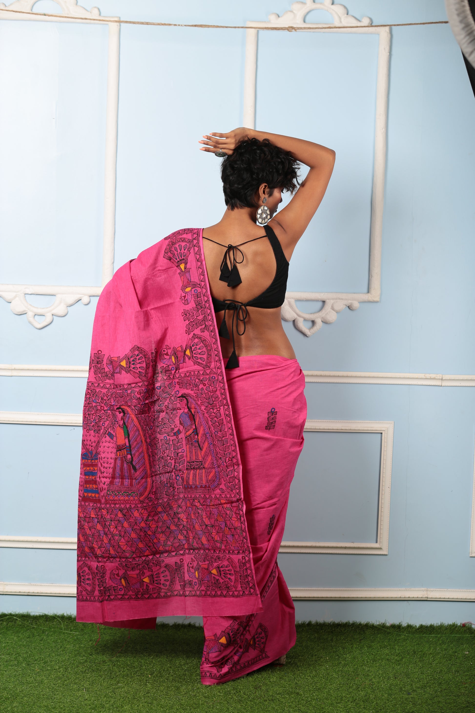 Woman in a magenta Madhubani art silk saree, ideal for brunch. | Urbane Essence