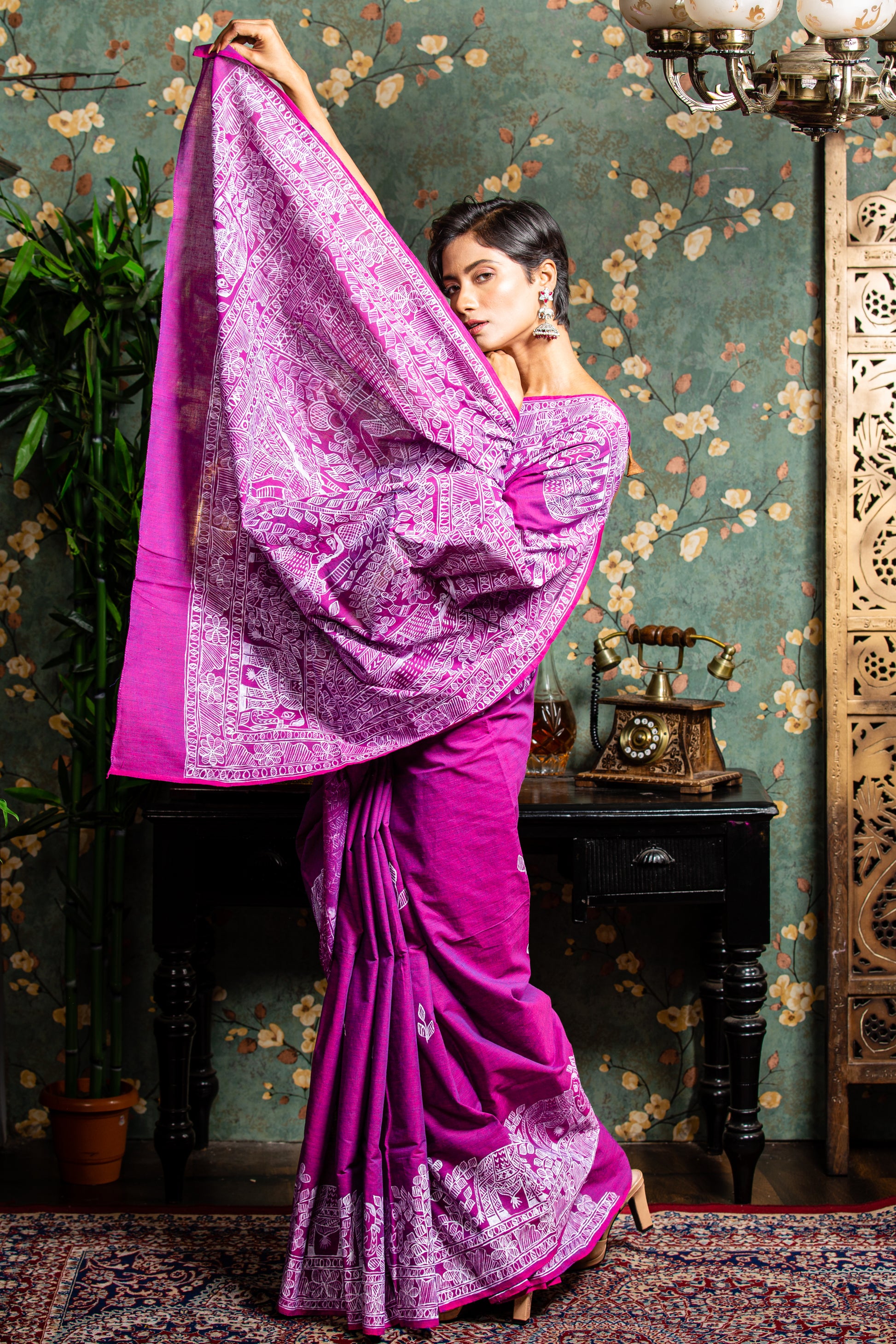 Magenta Tussar silk saree with white Madhubani painting on border and pallu, perfect for cultural events | Urbane Essence