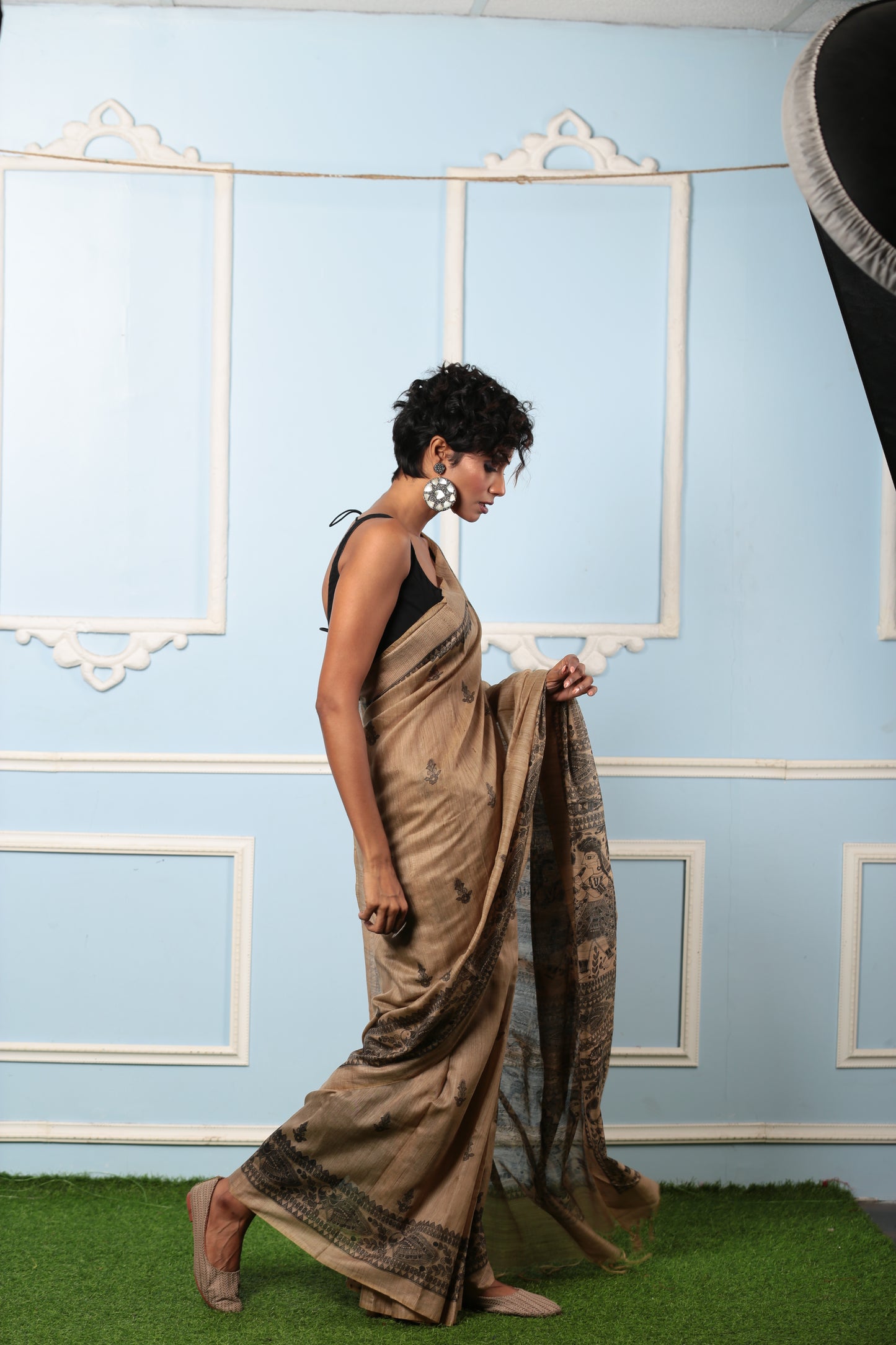 Elegant beige silk Madhubani saree with black princess tale design, perfect for gifting. | Urbane Essence