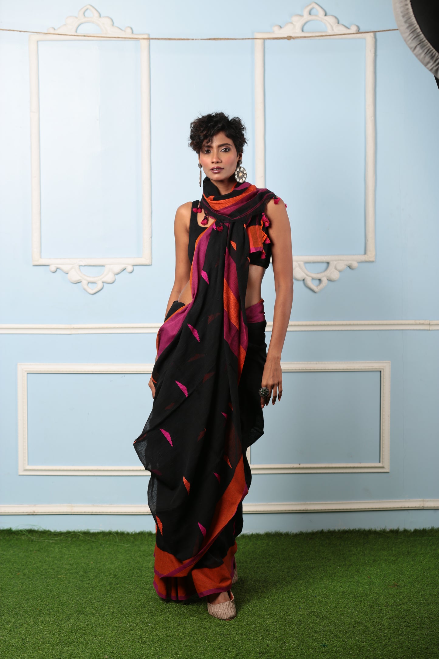Black Bengal Khadi saree with broad orange and purple border, perfect for a style statement | Urbane Essence