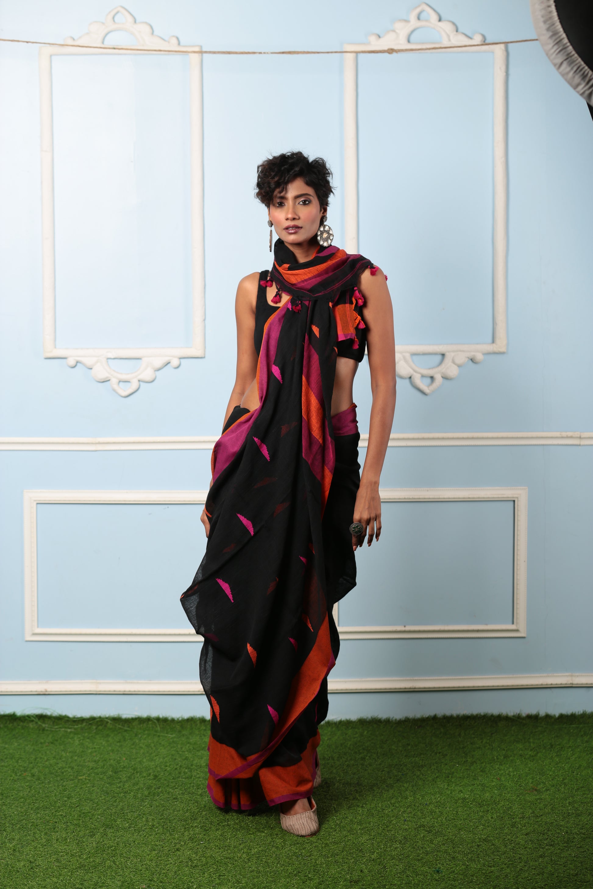 Black Bengal Khadi saree with broad orange and purple border, perfect for a style statement | Urbane Essence
