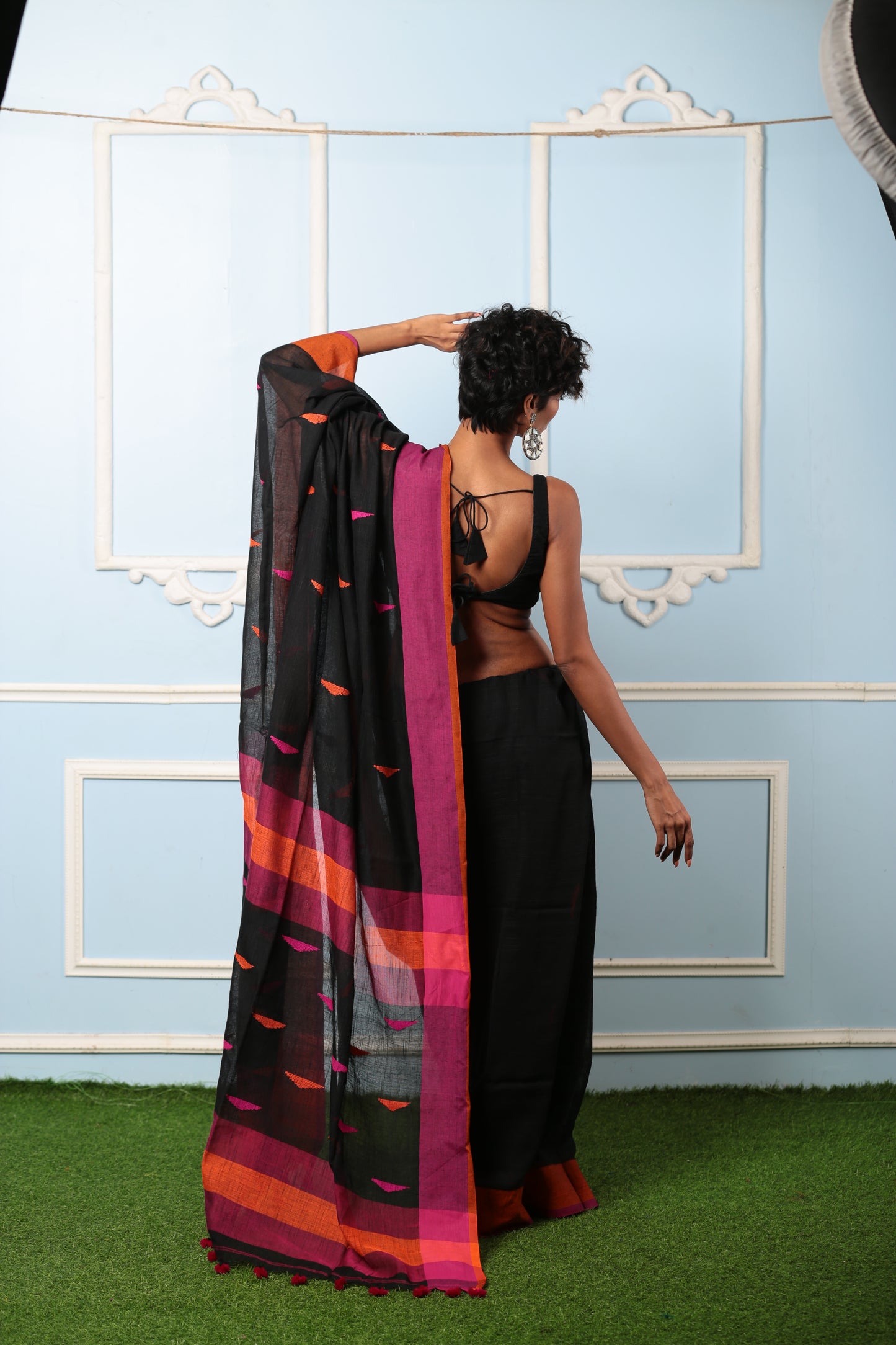 Black Bengal Khadi saree with broad orange and purple border, perfect for subtle style. | Urbane Essence