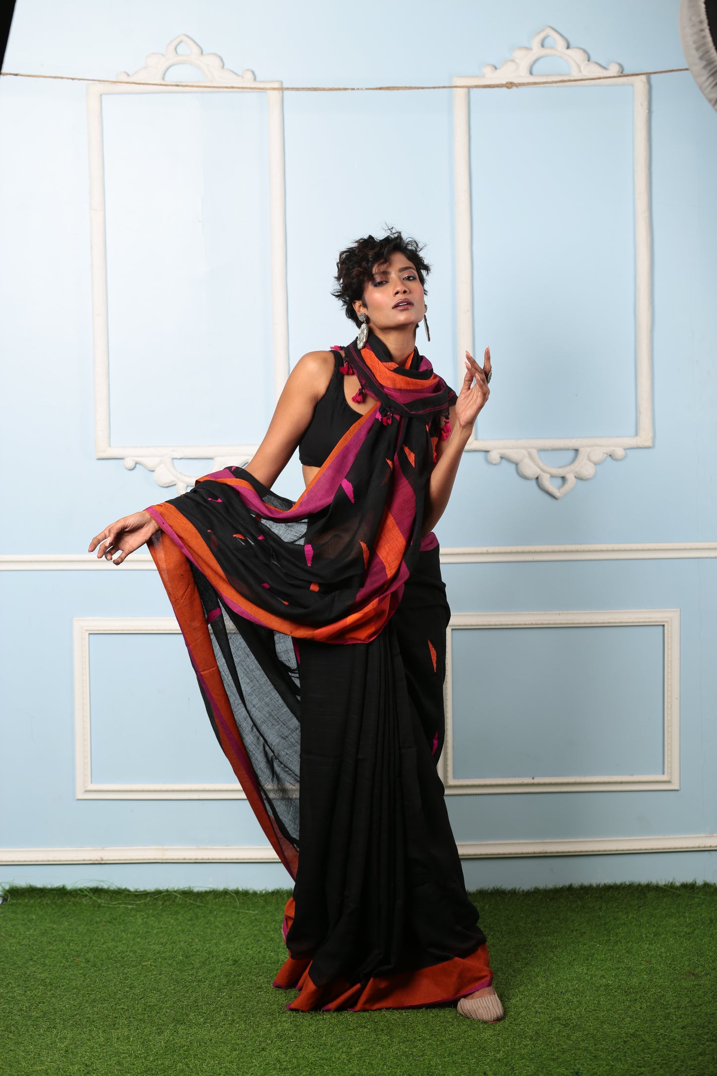 Black Bengal Khadi saree with broad orange and purple border, perfect for a subtle style statement | Urbane Essence