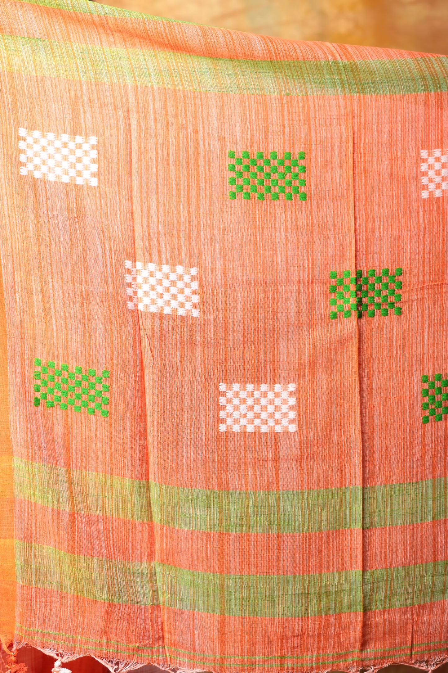 Assam Khadi saree in Abendrot (evening red) with orange checker pattern, white & green squares, suitable for day events | Urbane Essence