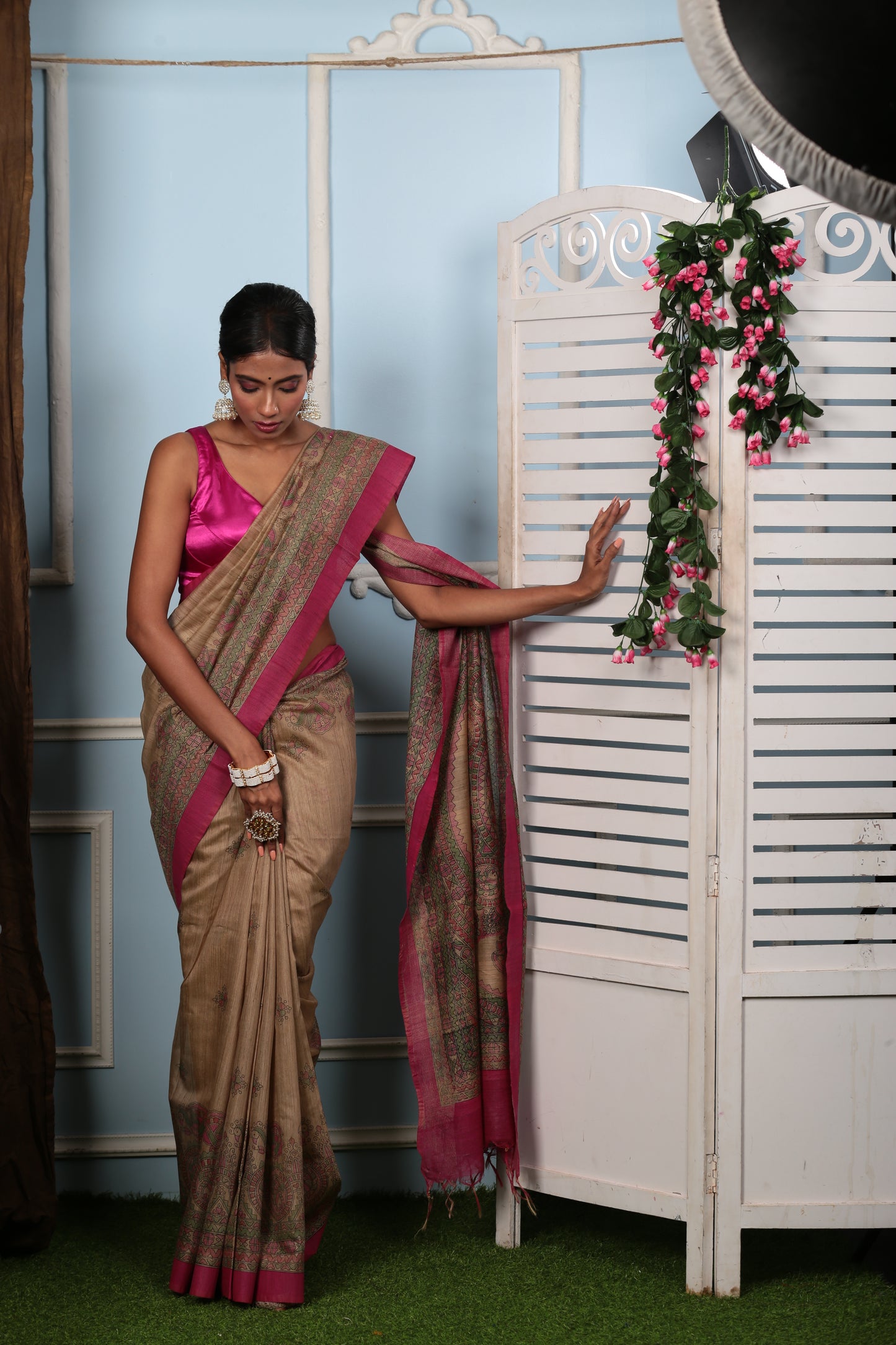 Elegant beige Madhubani cotton saree with pink border, ideal for professional events | Urbane Essence