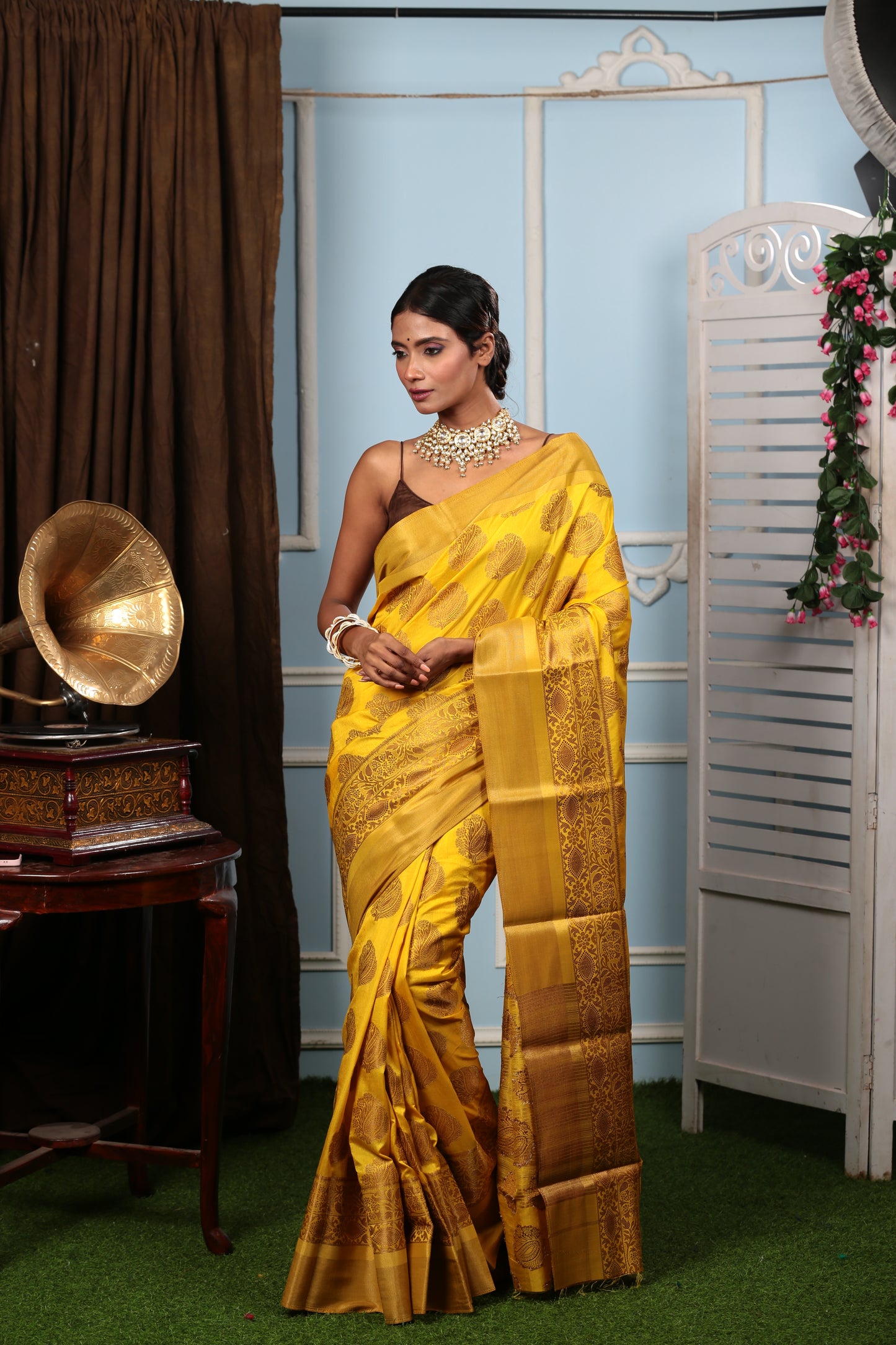 Bright yellow South silk saree with brown border, perfect for fun events. | Urbane Essence