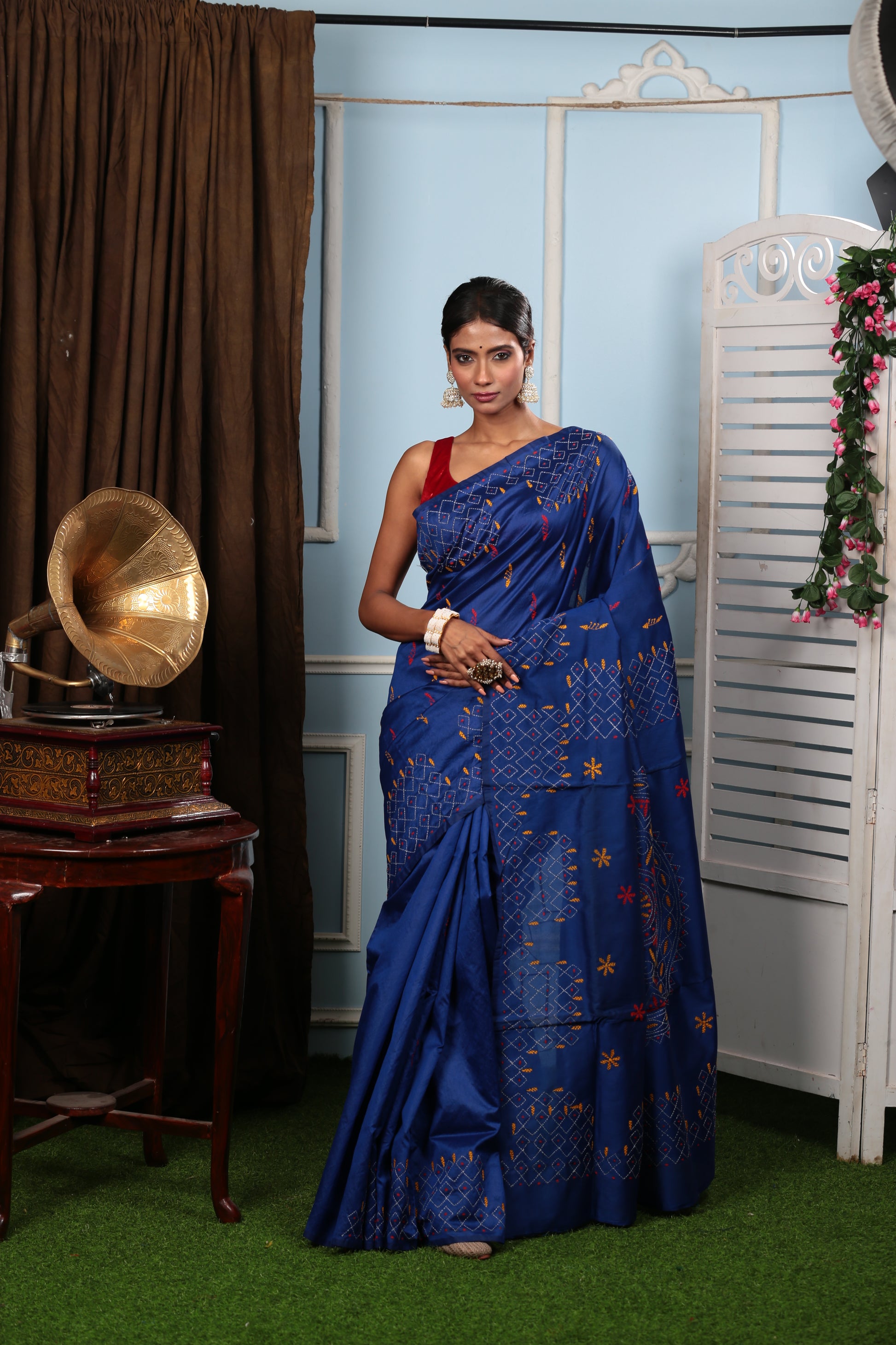 Royal blue Kantha stitch saree with yellow and red motifs, perfect for evening events | Urbane Essence