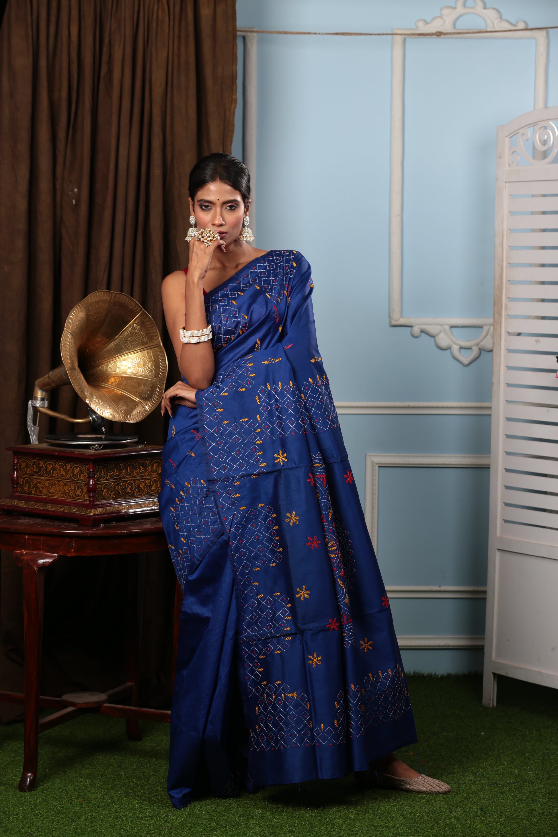 Royal blue Kantha silk saree with yellow and red embroidery, perfect for evening events | Urbane Essence