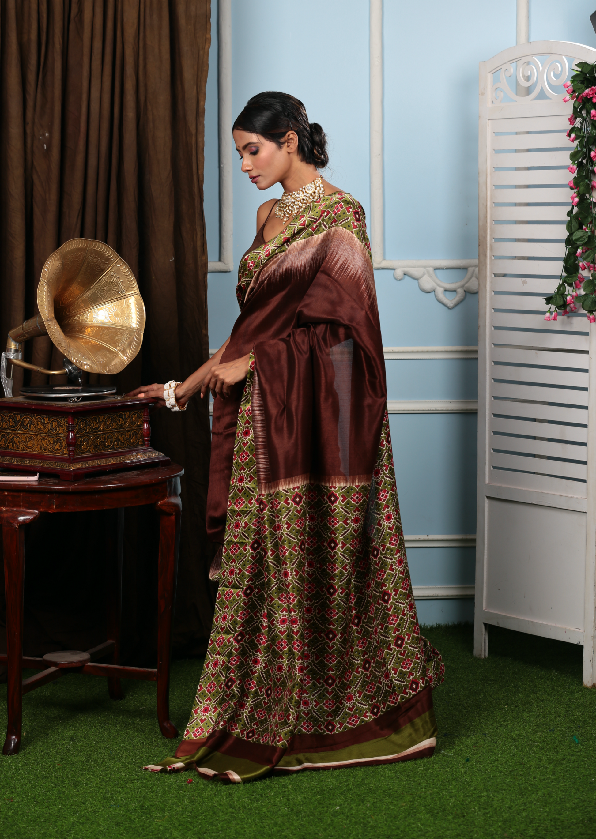 Elegant brown blend silk Ikat saree with green and pink geometric patterns, perfect for festive occasions | Urbane Essence