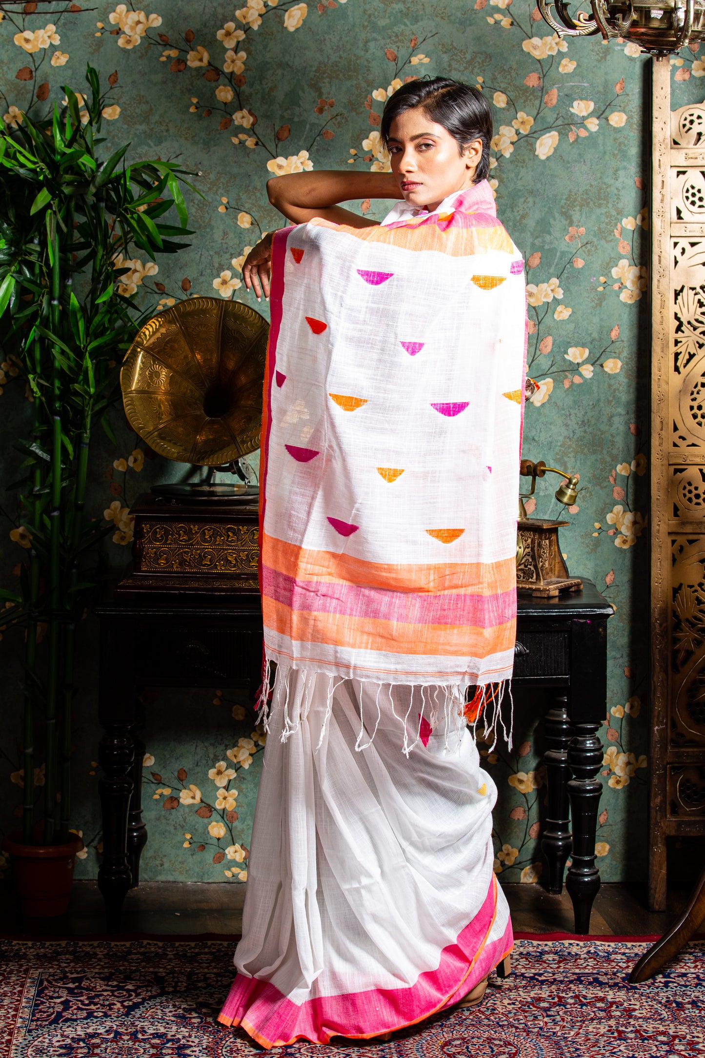 Assam Khadi Saree: White and pink handcrafted saree with yellow/orange border, perfect for traditional occasions | Urbane Essence