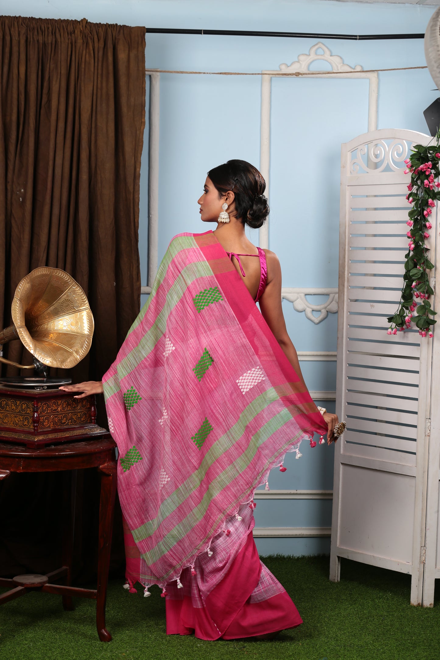 Pink Bengal Khadi saree with green striped pallu and geometric motifs, perfect for festive wear. | Urbane Essence