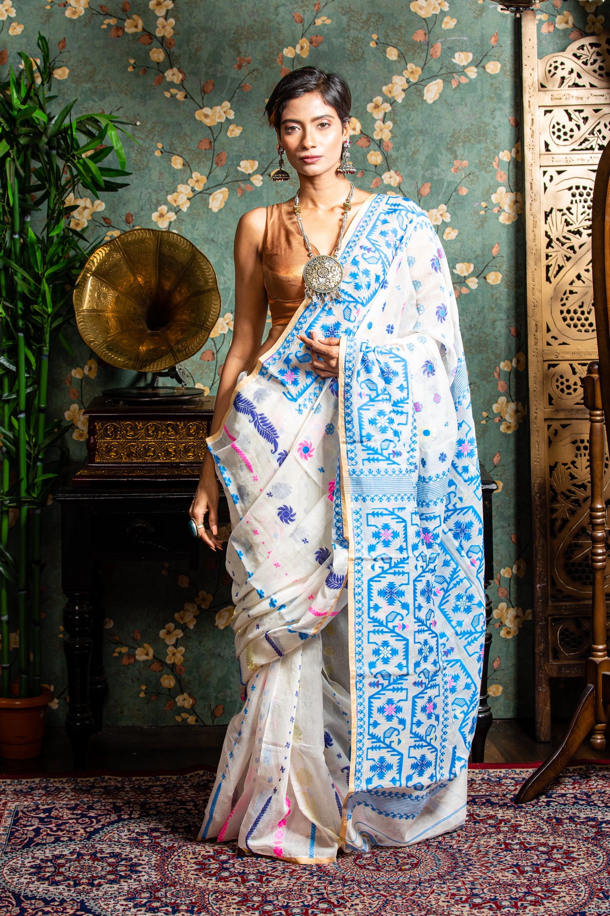 White cotton Jamdani saree with blue and pink motifs, perfect for Pujas or work | Urbane Essence