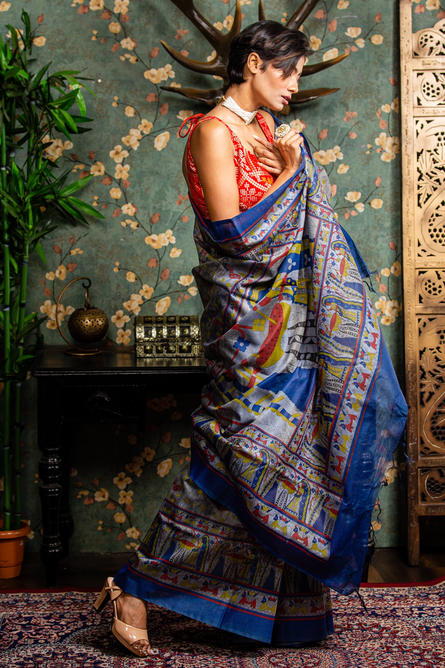 Vibrant blue Tussar silk saree with all-over Madhubani painting, perfect for special occasions | Urbane Essence