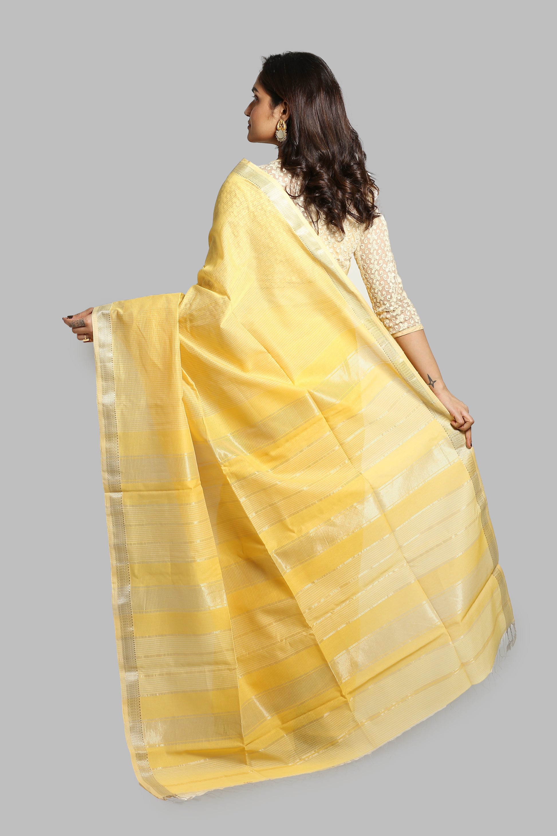 Bumblebee yellow tissue silk saree with thin silver zari border and horizontal pallu zari work, perfect for any affair | Urbane Essence