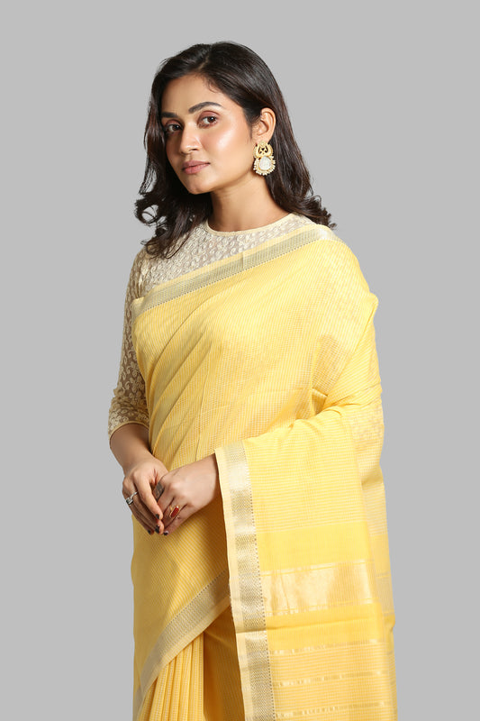 Prized Bumblebee Tissue Silk Saree: yellow raw silk with thin silver zari border, perfect for any affair | Urbane Essence
