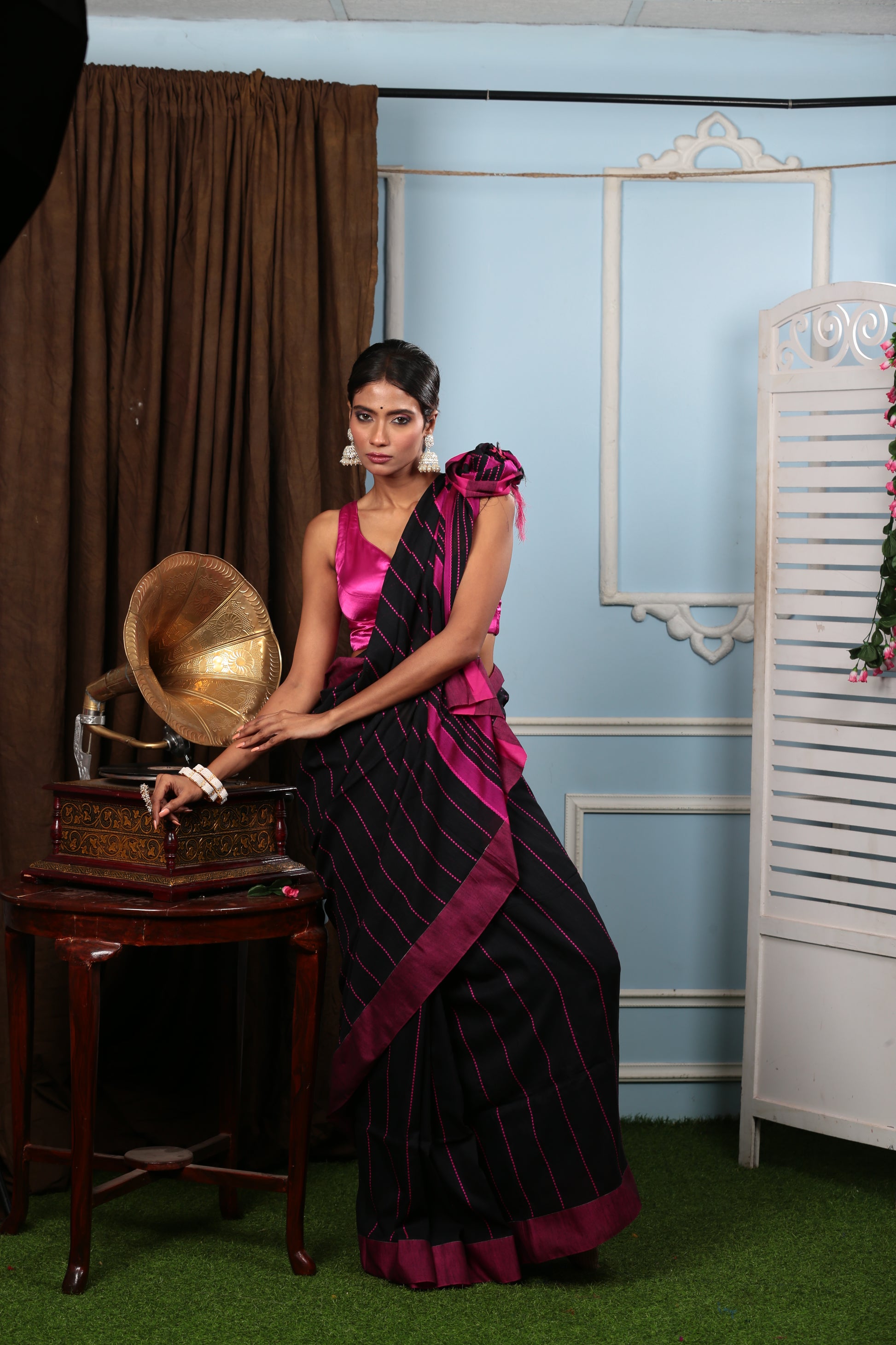 Elegant black Bengal Khadi saree with pink border and thin lines, perfect for parties. | Urbane Essence