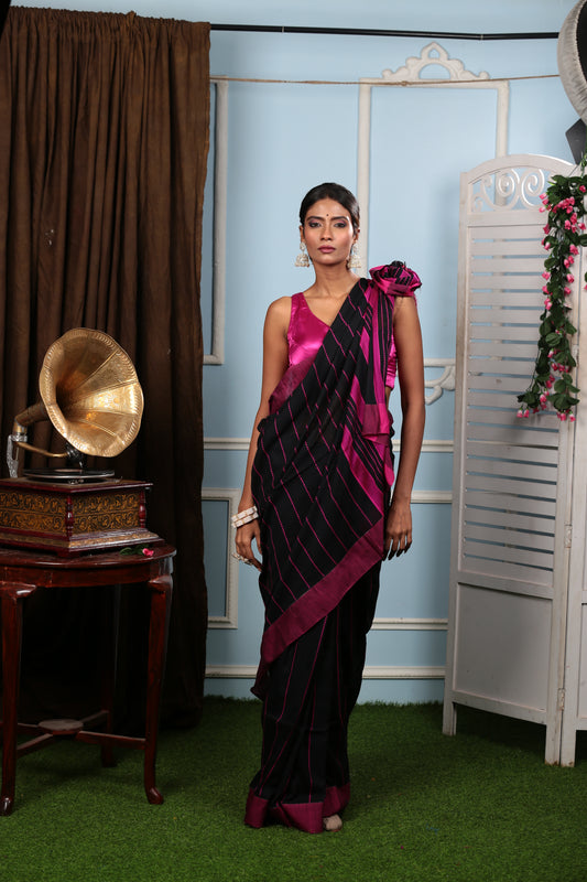 Elegant black Bengal Khadi saree with broad pink border and thin lines, perfect for parties. | Urbane Essence