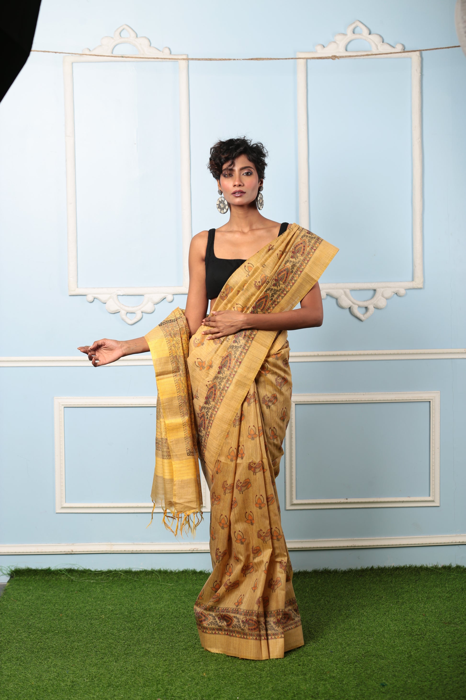 Model in a golden yellow Tussar silk digital print saree, perfect for festive occasions | Urbane Essence