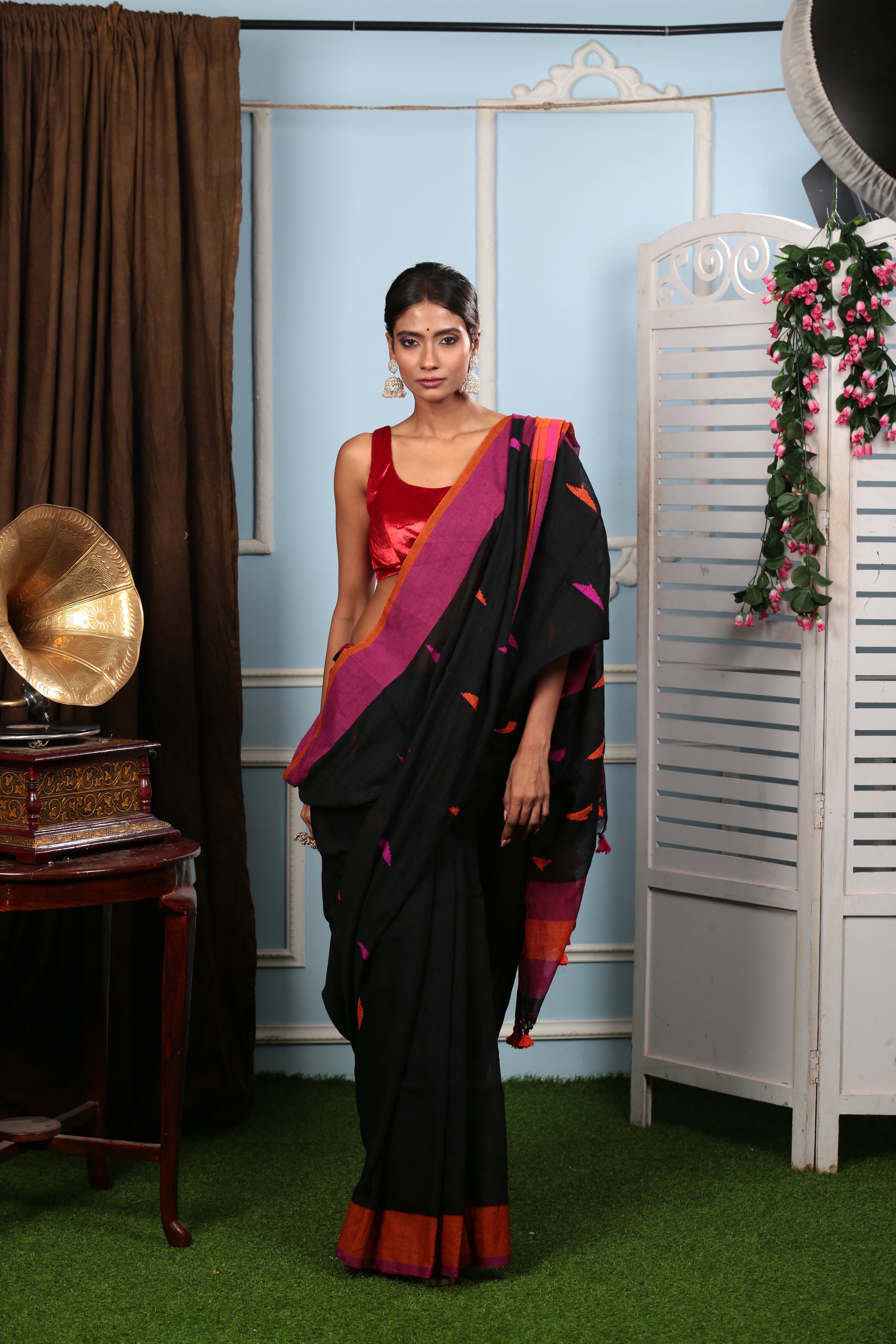 Assamese Khadi Saree in black with vibrant pink and orange accents, perfect for festive occasions. | Urbane Essence