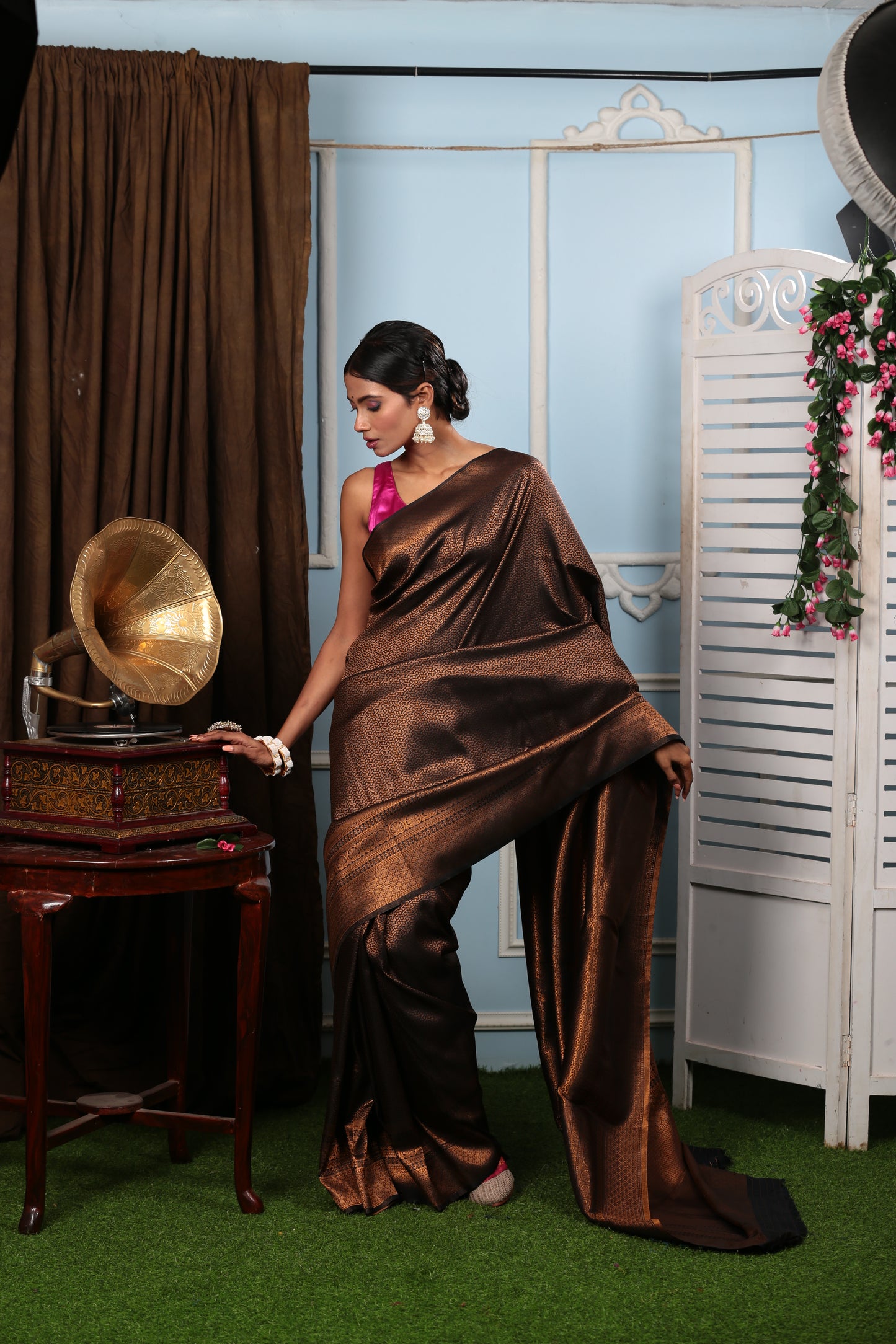 Elegant model in a brown and copper silk saree, perfect for weddings and celebrations | Urbane Essence