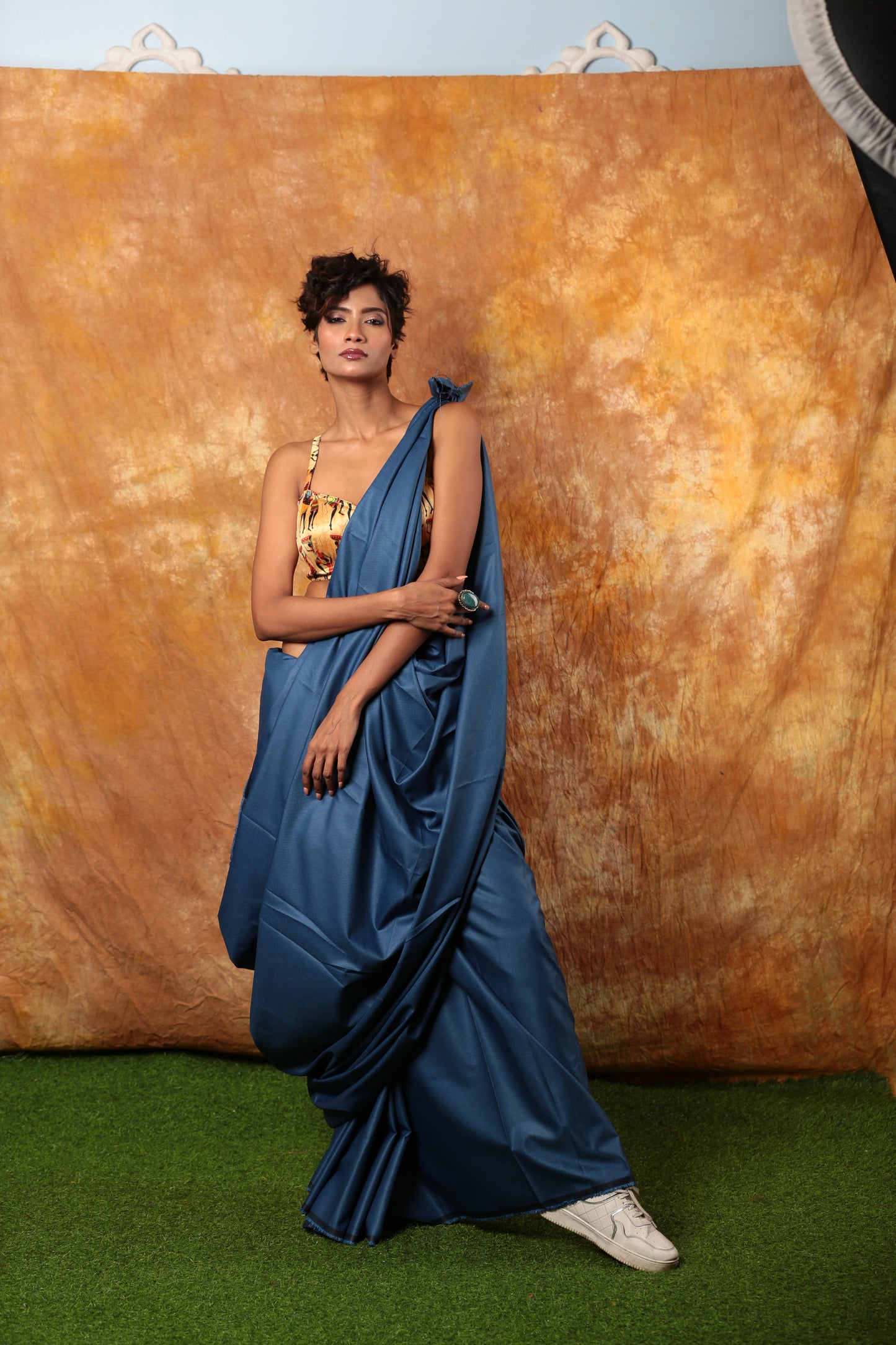 Stylish woman in a blue denim saree with a printed blouse, perfect for casual occasions | Urbane Essence